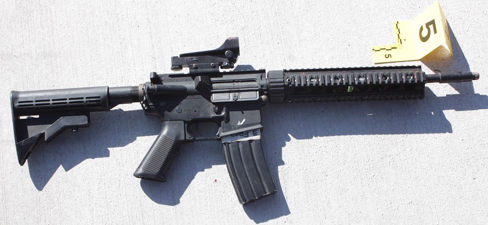 An AR-15 is displayed after a man who allegedly pointed it at officers on Feb. 15, 2015, was shot and killed by police in Provo. The U.S. House of Representatives on Wednesday passed some of the toughest gun control measures Congress has approved in years, banning the sale of semiautomatic weapons to those under the age of 21 and banning the sale of large-capacity magazines.