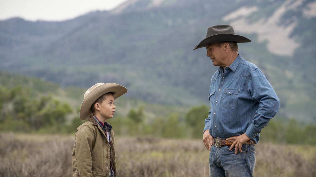 Brecken Merrill as Tate Dutton, left, and Kevin Costner as John Dutton in an episode of the third season of “Yellowstone.” Costner's production is one of 13 coming to Utah.