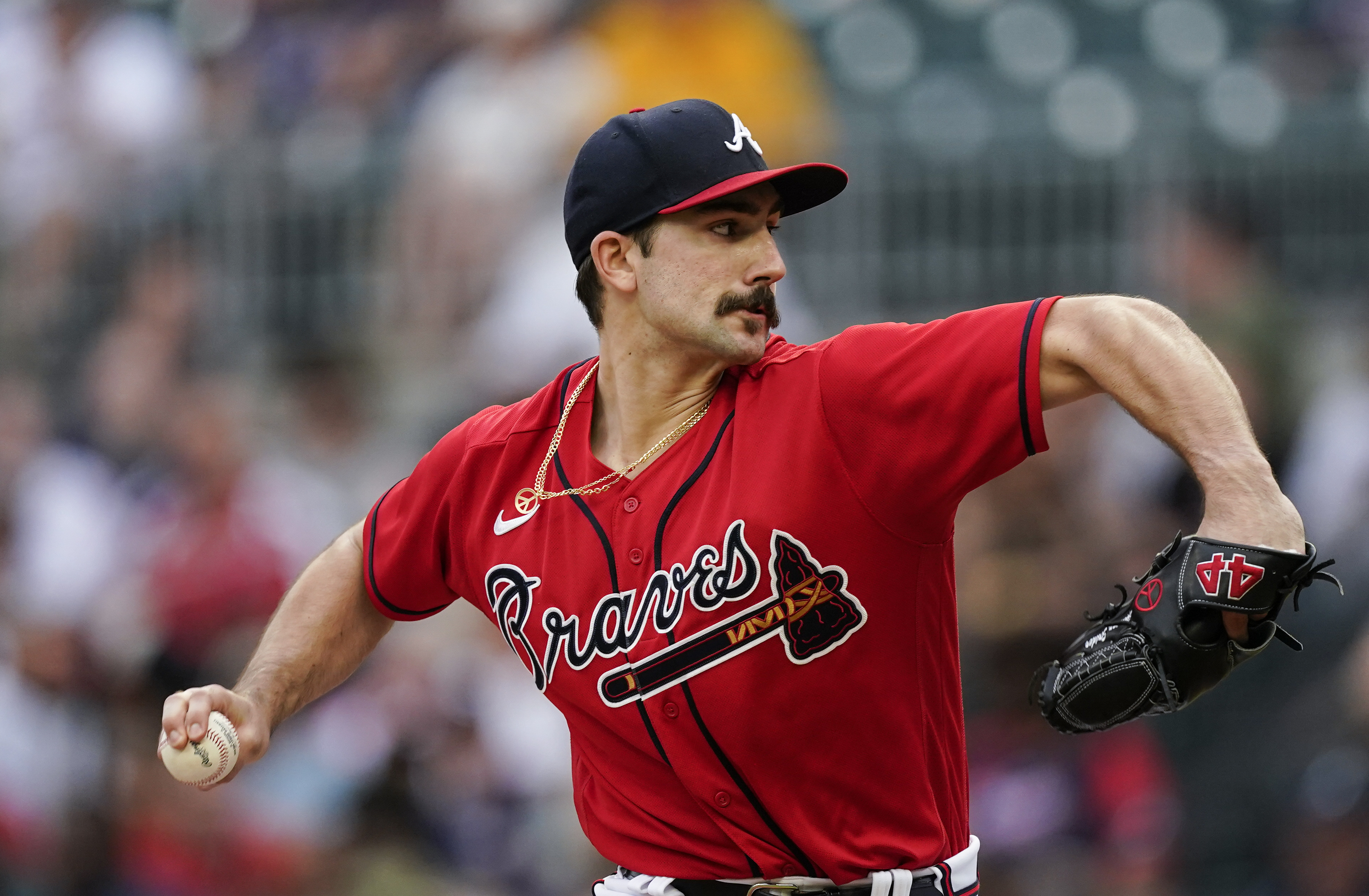 Atlanta Braves starting pitcher Spencer Strider (65) delivers in the first inning of the team's baseball game against the Pittsburgh Pirates on Friday, June 10, 2022, in Atlanta. 