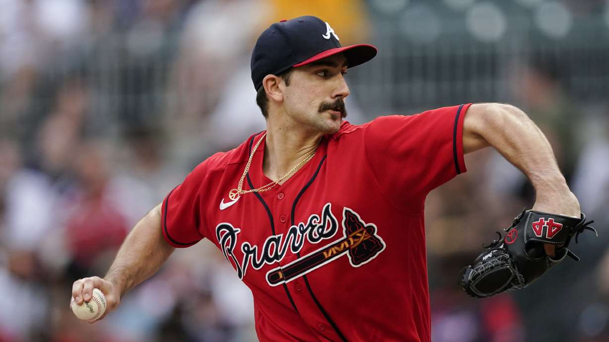 Atlanta Braves starting pitcher Spencer Strider (65) delivers in the first inning of the team's baseball game against the Pittsburgh Pirates on Friday, June 10, 2022, in Atlanta.