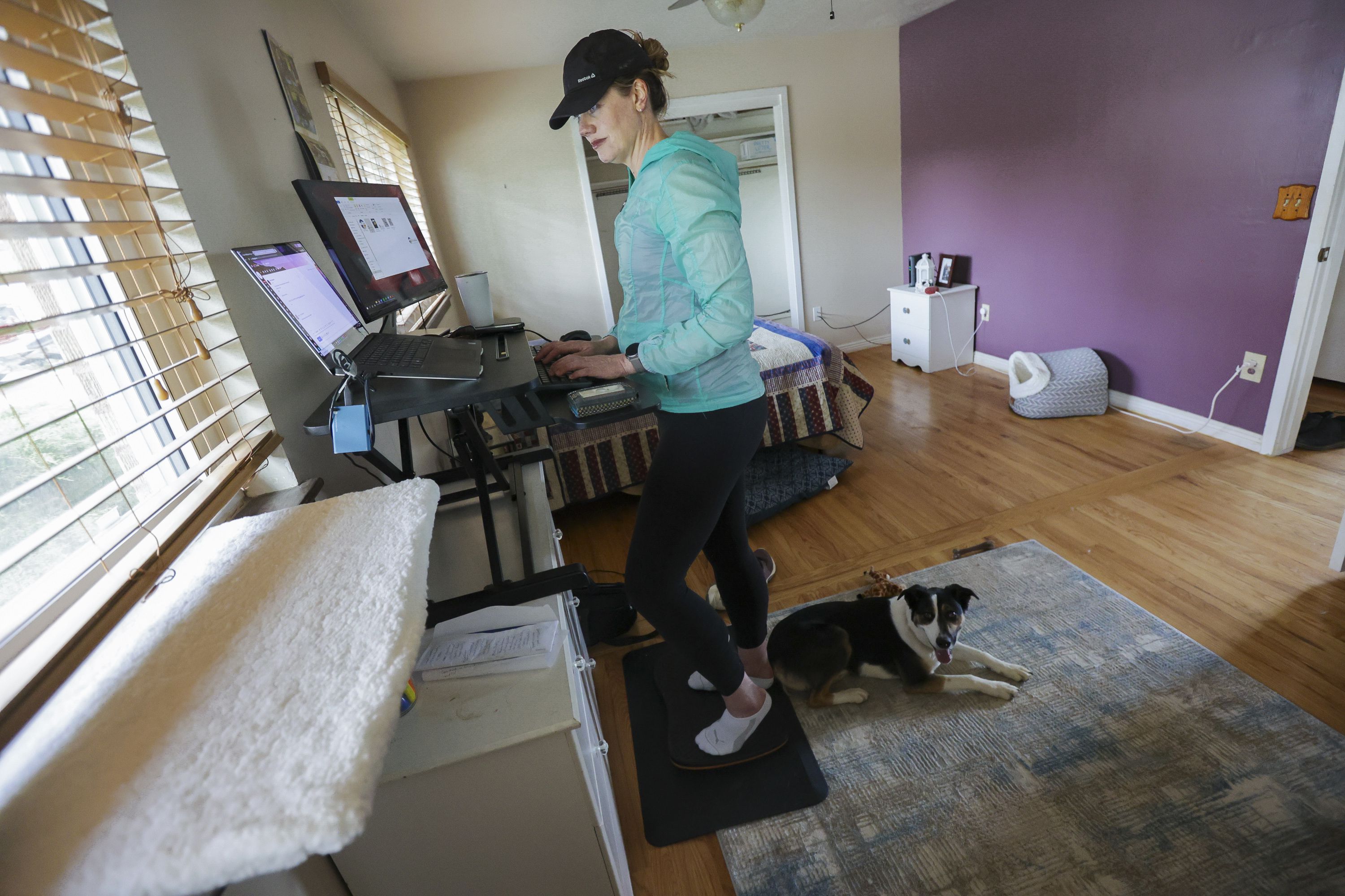 Lara Gale replies to a work email at her house in Ogden on May 12. As the price of housing shoots higher and higher into the clouds with no clear end in sight, millennials — and yes, Gen Z — are finding it nearly impossible to afford a home.