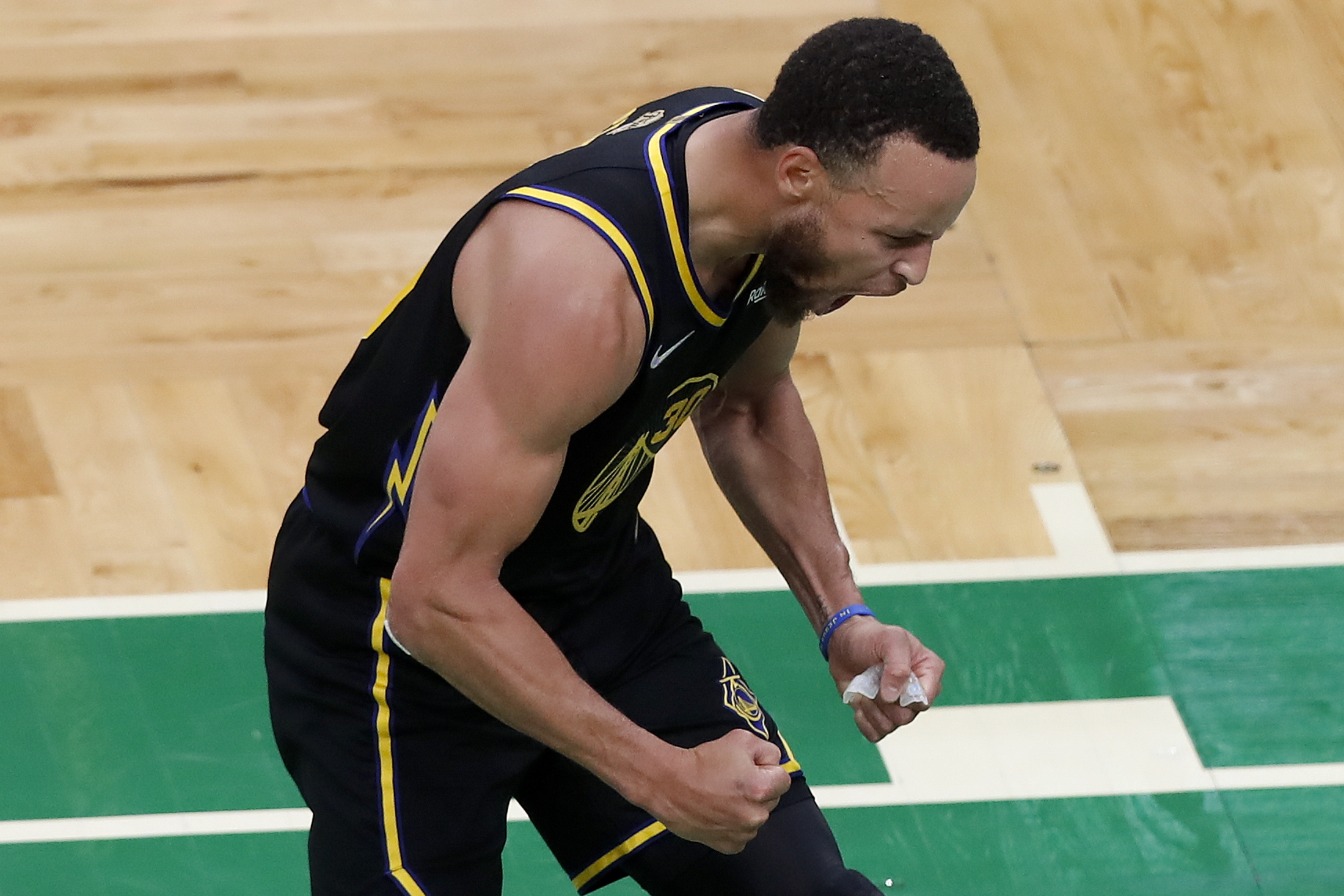Golden State Warriors guard Stephen Curry (30) reacts during the fourth quarter of Game 4 of basketball's NBA Finals against the Boston Celtics, Friday, June 10, 2022, in Boston. 
