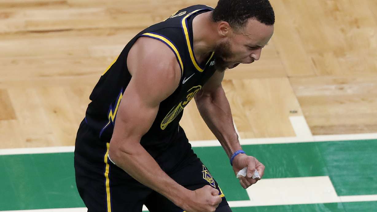 Golden State Warriors guard Stephen Curry (30) reacts during the fourth quarter of Game 4 of basketball's NBA Finals against the Boston Celtics, Friday, June 10, 2022, in Boston.
