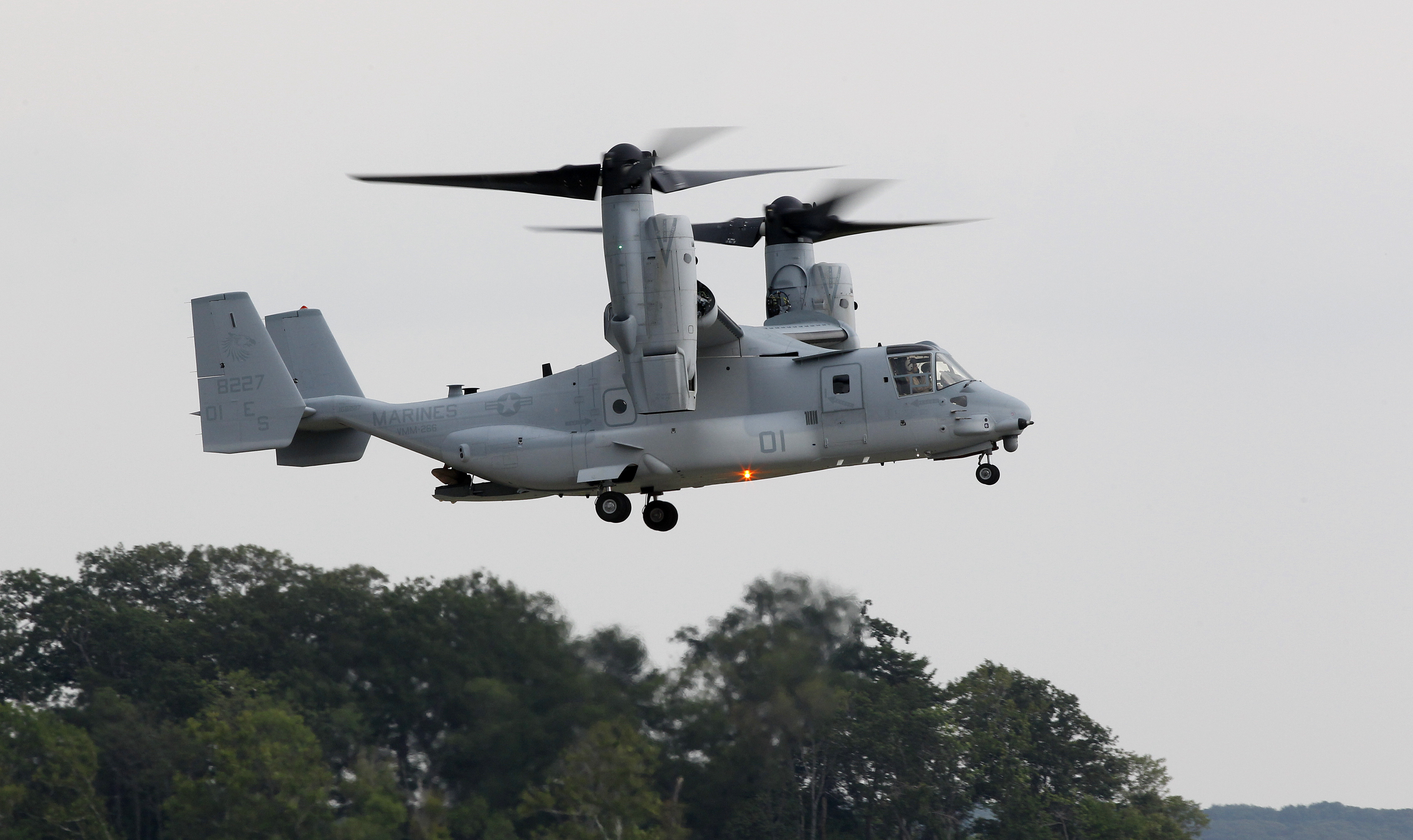 FILE - A MV-22B Osprey tiltrotor aircraft flies at Marine Corps Air Facility at Marine Corps Base in Quantico, Va., on on Aug. 3, 2012. Officials say a Marine Corps MV-22B Osprey carrying five Marines crashed in the Southern California desert, Wednesday afternoon, June 8, 2022, during training in a remote area near the community of Glamis in Imperial County. Military officials have yet to release official word on the fate of the five Marines. 