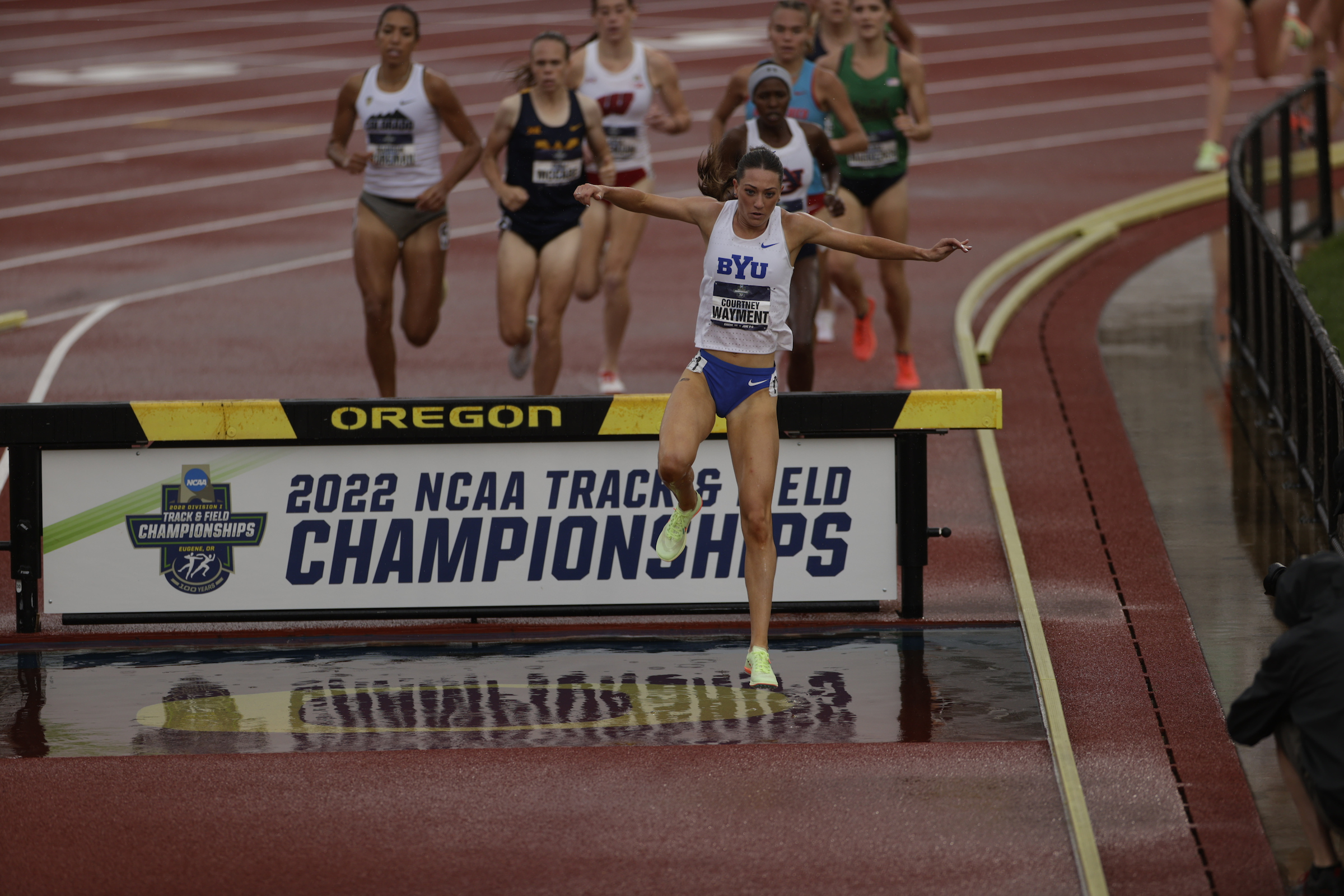BYU distance runner Courtney Wayment leaps over the barrier while winning the 3,000-meter steeplechase national title by six seconds, Saturday, June 11, 2022 at the NCAA outdoor track and field championships in Eugene, Oregon.