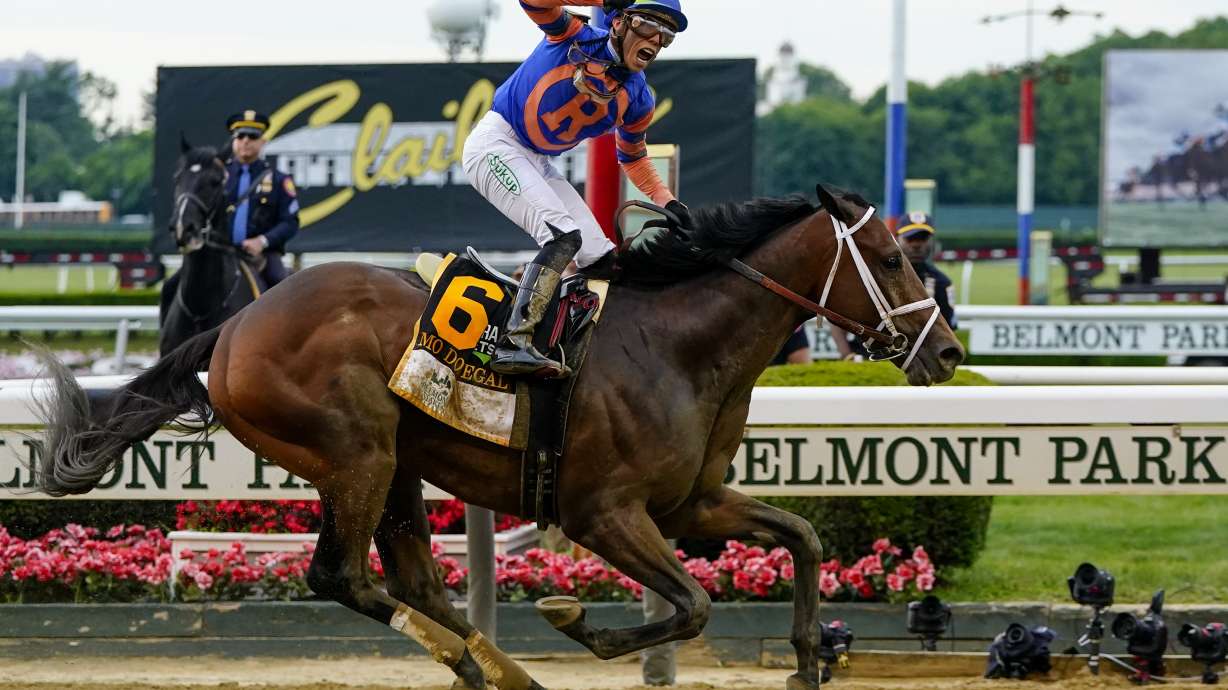 Mo Donegal (6), with jockey Irad Ortiz Jr. up, crosses the finish line to win the 154th running of the Belmont Stakes horse race, Saturday, June 11, 2022, at Belmont Park in Elmont, N.Y.