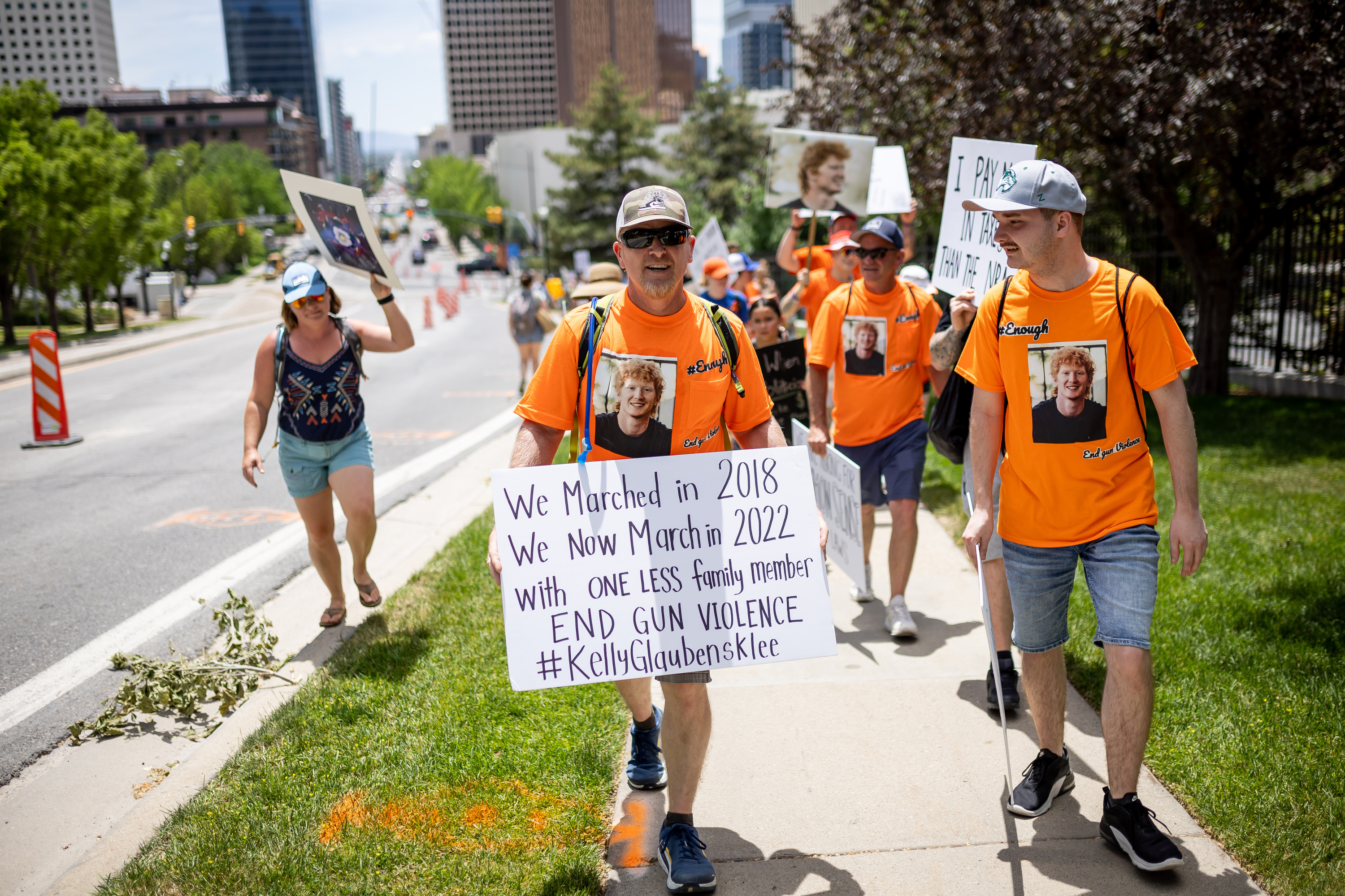 James Glaubensklee, center, whose son Kelly was killed in a shooting in 2021, takes part in the March for Our Lives rally against gun violence in Salt Lake City on Saturday.