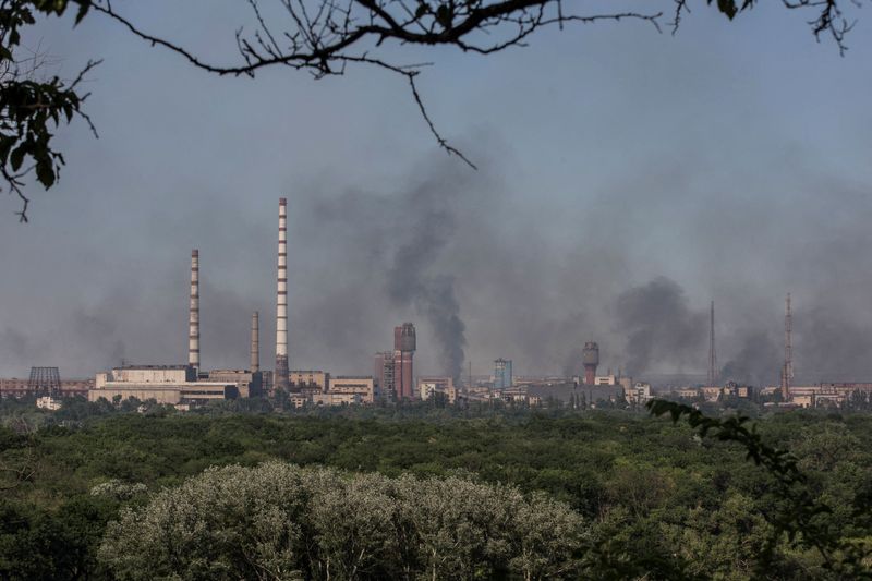 Smoke rises after a military strike on a compound of Sievierodonetsk's Azot Chemical Plant, amid Russia's attack on Ukraine, in the town of Lysychansk, Luhansk region, Ukraine, on Friday.