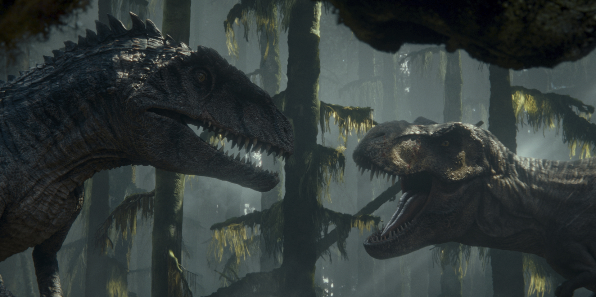 This image released by Universal Pictures shows a Giganotosaurus, left, and a T. Rex in a scene from "Jurassic World Dominion." The movie took a mighty bite out of the box office with $143.4 million in North American ticket sales according to studio estimates Sunday.