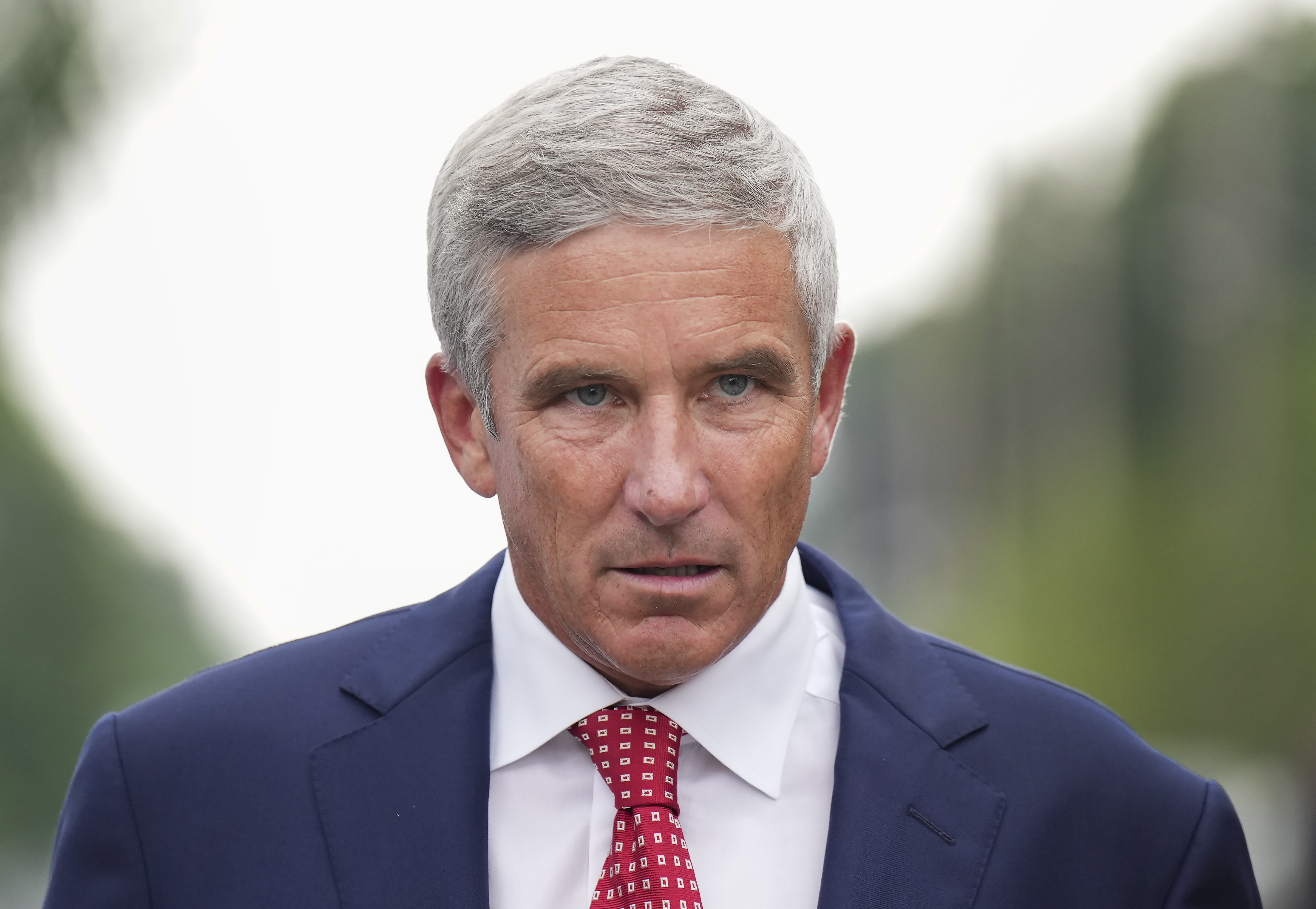PGA Tour Commissioner Jay Monahan leaves after speaking with sports commentator Jim Nantz regarding the LIV Golf tour during fourth round of the Canadian Open at St. George's Golf and Country Club in Toronto, Sunday, June 12, 2022. 