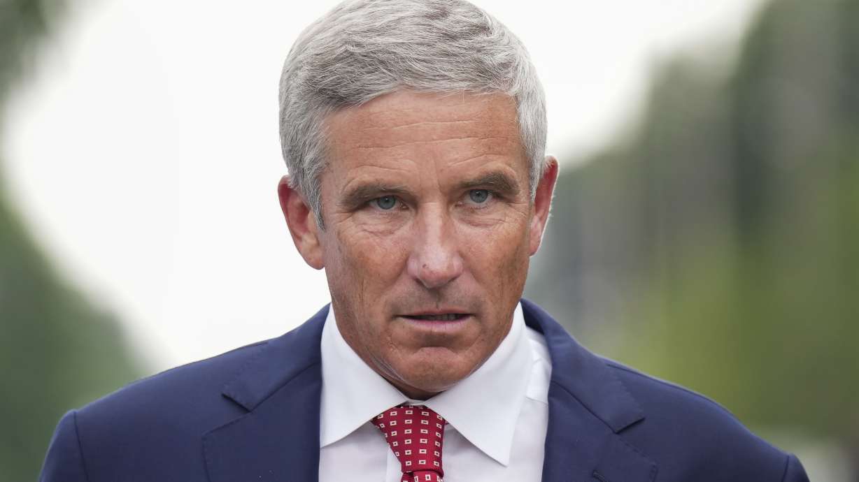 PGA Tour Commissioner Jay Monahan leaves after speaking with sports commentator Jim Nantz regarding the LIV Golf tour during fourth round of the Canadian Open at St. George's Golf and Country Club in Toronto, Sunday, June 12, 2022.