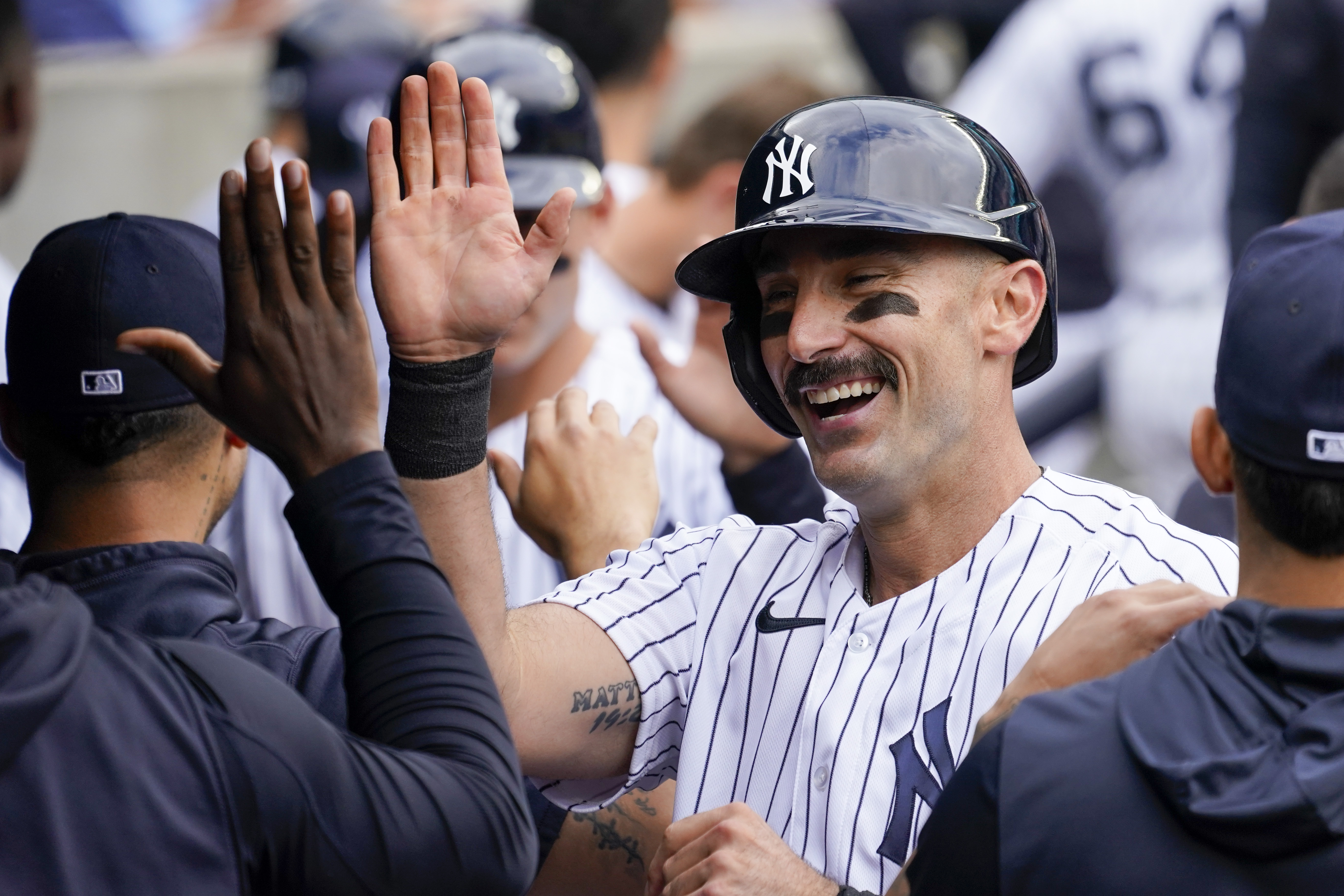 New York Yankees' Matt Carpenter celebrates after hitting a two-run home run in the sixth inning of a baseball game against the Chicago Cubs, Sunday, June 12, 2022, in New York. 