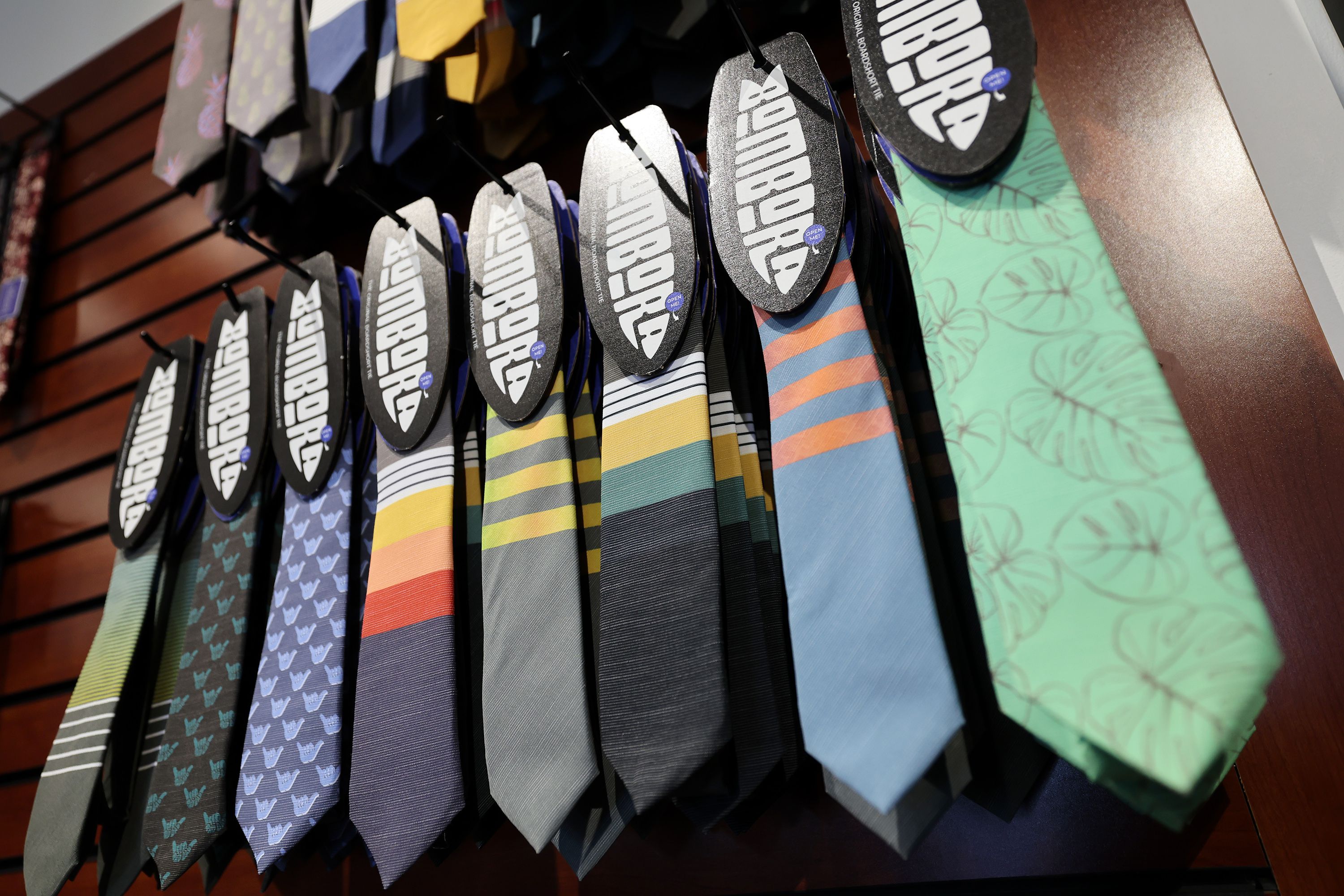 Ties created by the father and son team of Gregg and Zeke Greer are pictured at Modern Missionary in Orem on May 31. The ties are made of the quick-drying material used in surfer’s board shorts and are sold online, in surf shops and other retail outlets like Modern Missionary.