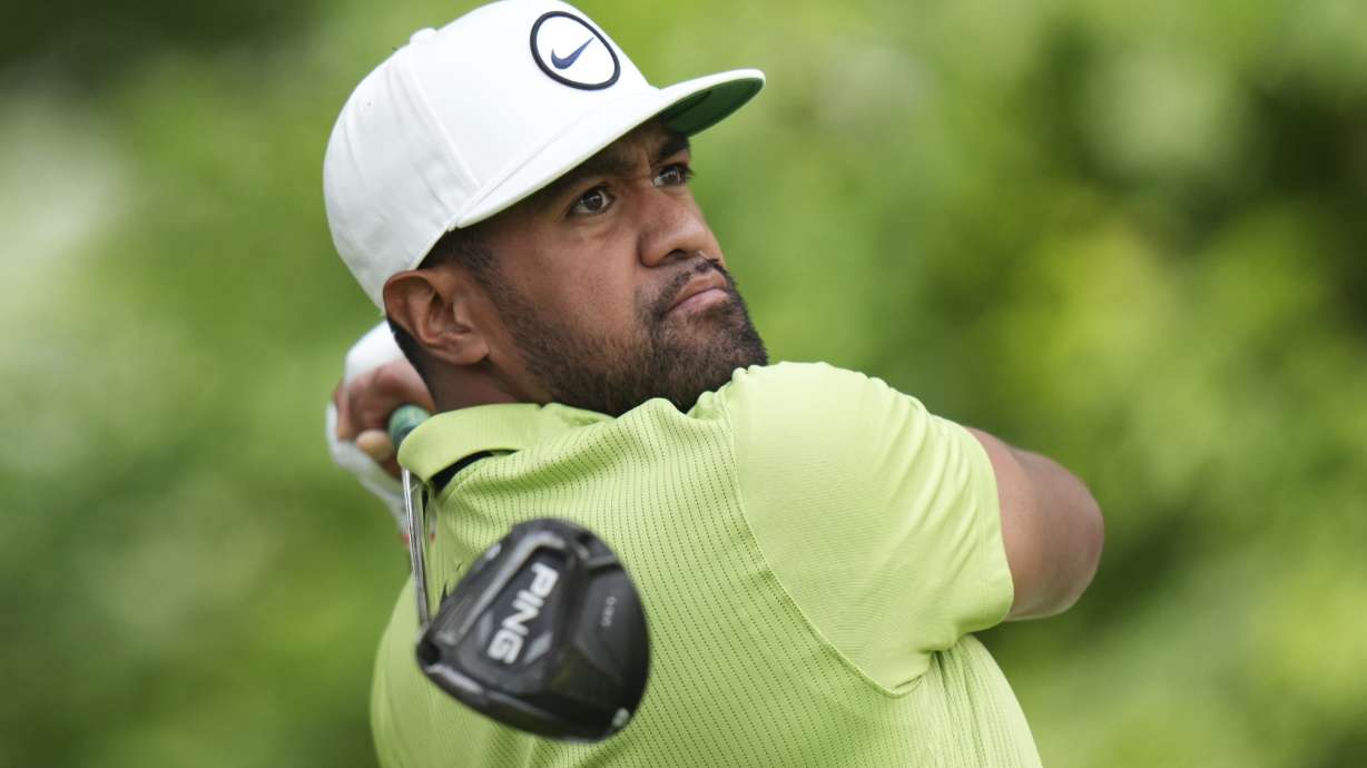 Tony Finau watches his tee shot on the second hole during the fourth round of the Canadian Open golf tournament in Toronto on Sunday, June 12, 2022.