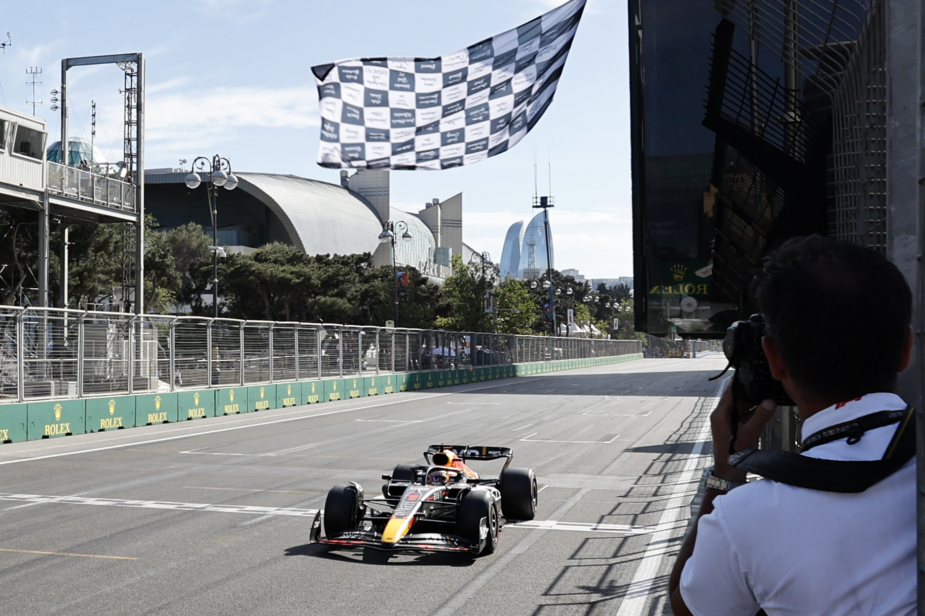 Red Bull driver Max Verstappen of the Netherlands crosses the finish line to win the Azerbaijan Formula One Grand Prix at the Baku circuit, in Baku, Azerbaijan, Sunday, June 12, 2022. 