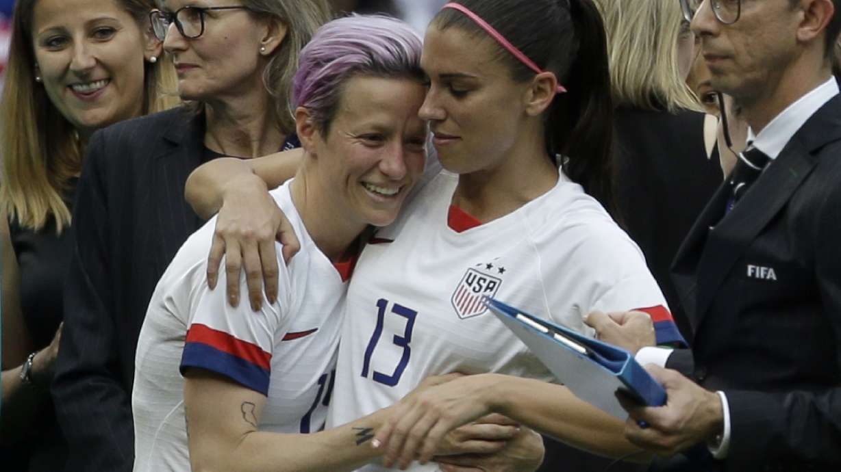 FILE - United States' Megan Rapinoe, left, and Alex Morgan celebrate after winning the Women's World Cup final soccer match between U.S. and The Netherlands at the Stade de Lyon in Decines, outside Lyon, France, Sunday, July 7, 2019. Rapinoe and Morgan were included on the U.S. national team roster for the upcoming CONCACAF W Championship, which will determine four of the region’s teams in the 2023 Women’s World Cup.