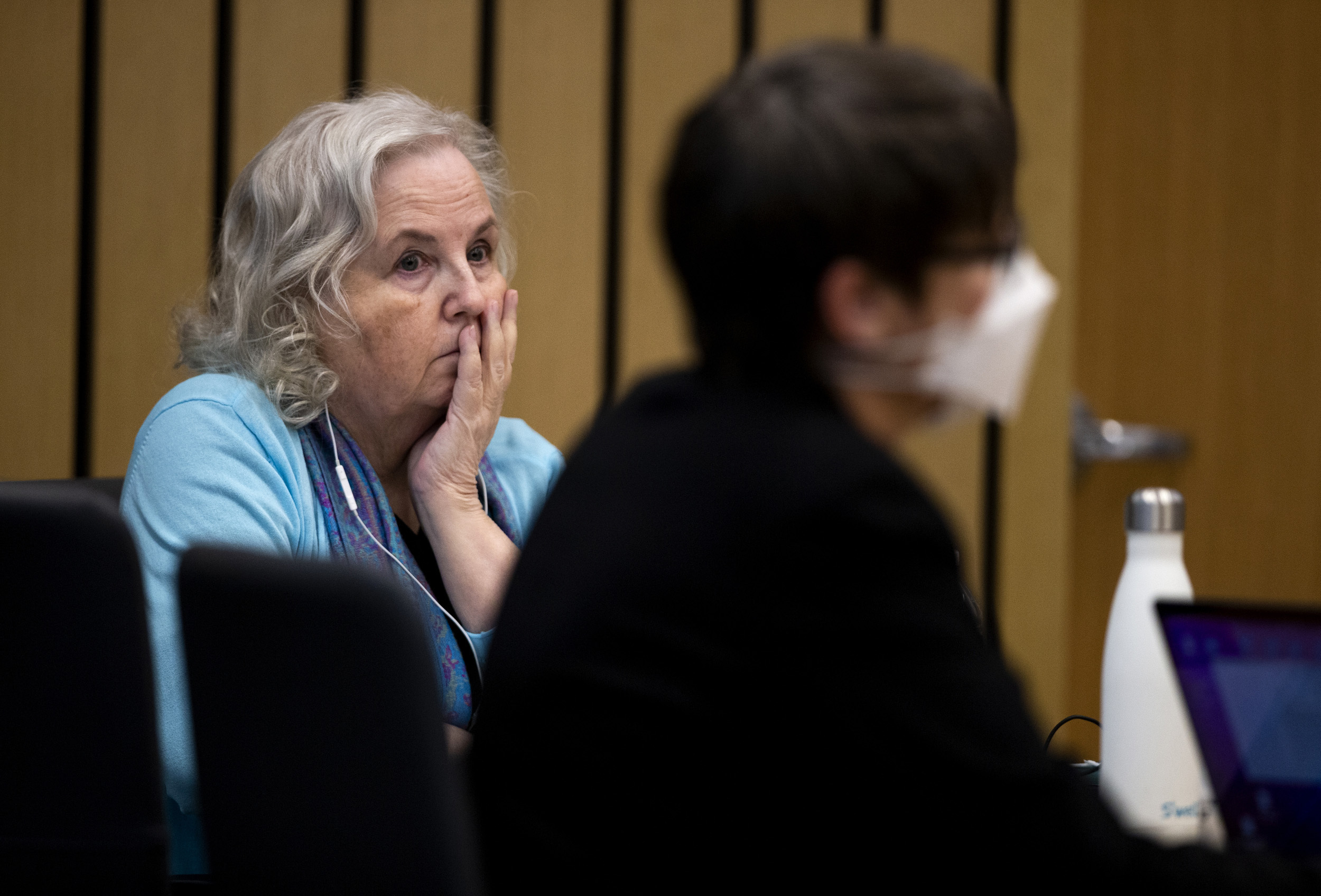 Romance writer Nancy Crampton Brophy, left, accused of killing her husband, Dan Brophy, in June 2018, watches proceedings in court in Portland, Ore., on April 4. She was sentenced Monday to life in prison with the possibility of parole for murdering her husband. 