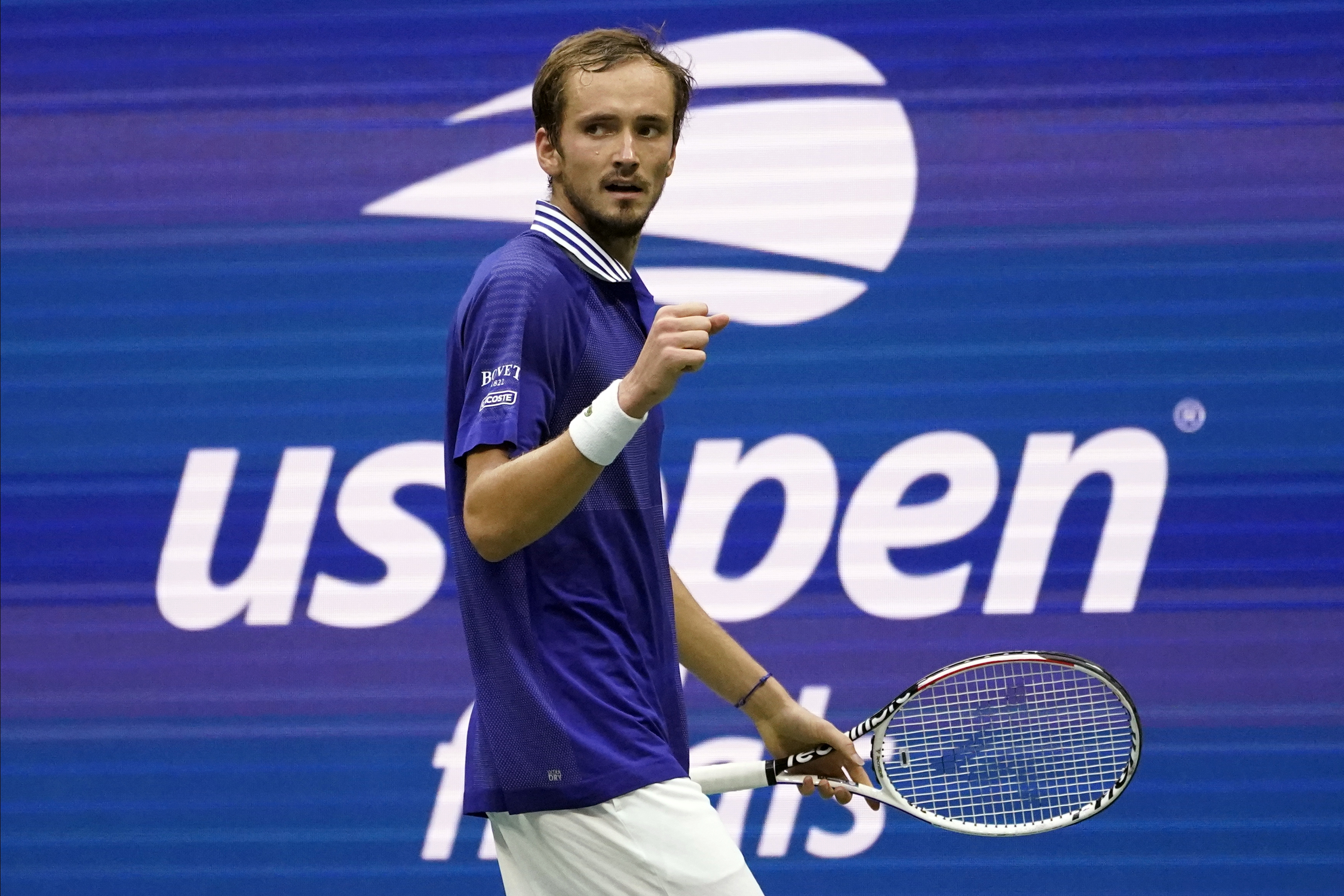 FILE - Daniil Medvedev, of Russia, reacts after scoring a point against Novak Djokovic, of Serbia, during the men's singles final of the U.S. Open tennis championships, Sunday, Sept. 12, 2021, in New York. The U.S. Open tennis tournament will allow players from Russia and Belarus to compete this year despite the ongoing invasion of Ukraine that prompted a ban at Wimbledon. 