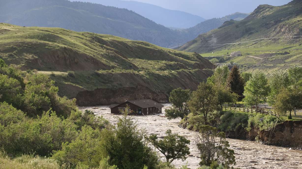 Yellowstone National Park employee housing flooded in Yellowstone River on Monday. Severe flooding has the park closed indefinitely; northern parts of the park may be closed for several months, park officials said Tuesday.