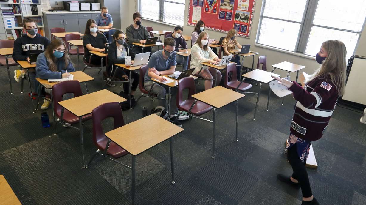 Mallory Record teaches a government and comparative politics class at Jordan High School on March 10, 2021. An audit made public Tuesday calls into question the value of administrative costs for local educational agencies — which account for $665 million annually for Utah school districts and charter schools.