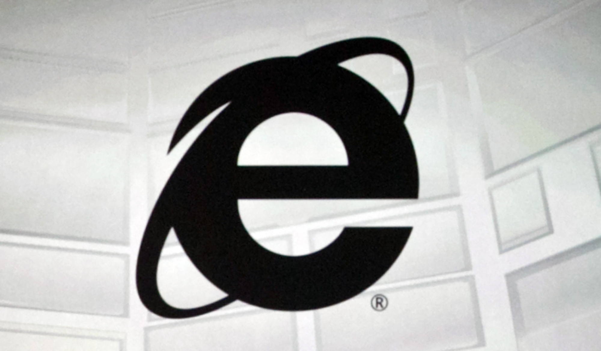 The Microsoft Internet Explorer logo is projected on a screen in Los Angeles, June 4, 2012. As of Wednesday, Microsoft will no longer support the once-dominant browser that legions of web surfers loved to hate and a few still claim to adore.