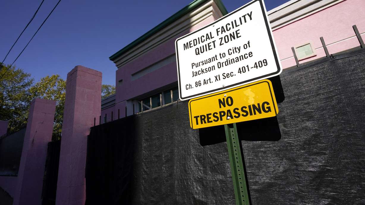A sign indicating a "Medical Facility Quiet Zone" is displayed outside the Jackson Women's Health Organization clinic in Jackson, Miss., Nov. 18, 2020. According to a report from the Guttmacher Institute released on Tuesday, fewer women were getting pregnant and a larger share of them chose abortion.