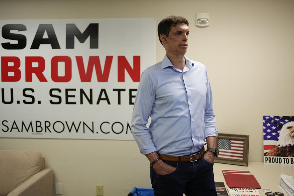 Nevada Republican Senate hopeful Sam Brown, a retired Army captain and Purple Heart recipient, stands in a campaign office Tuesday in Las Vegas.