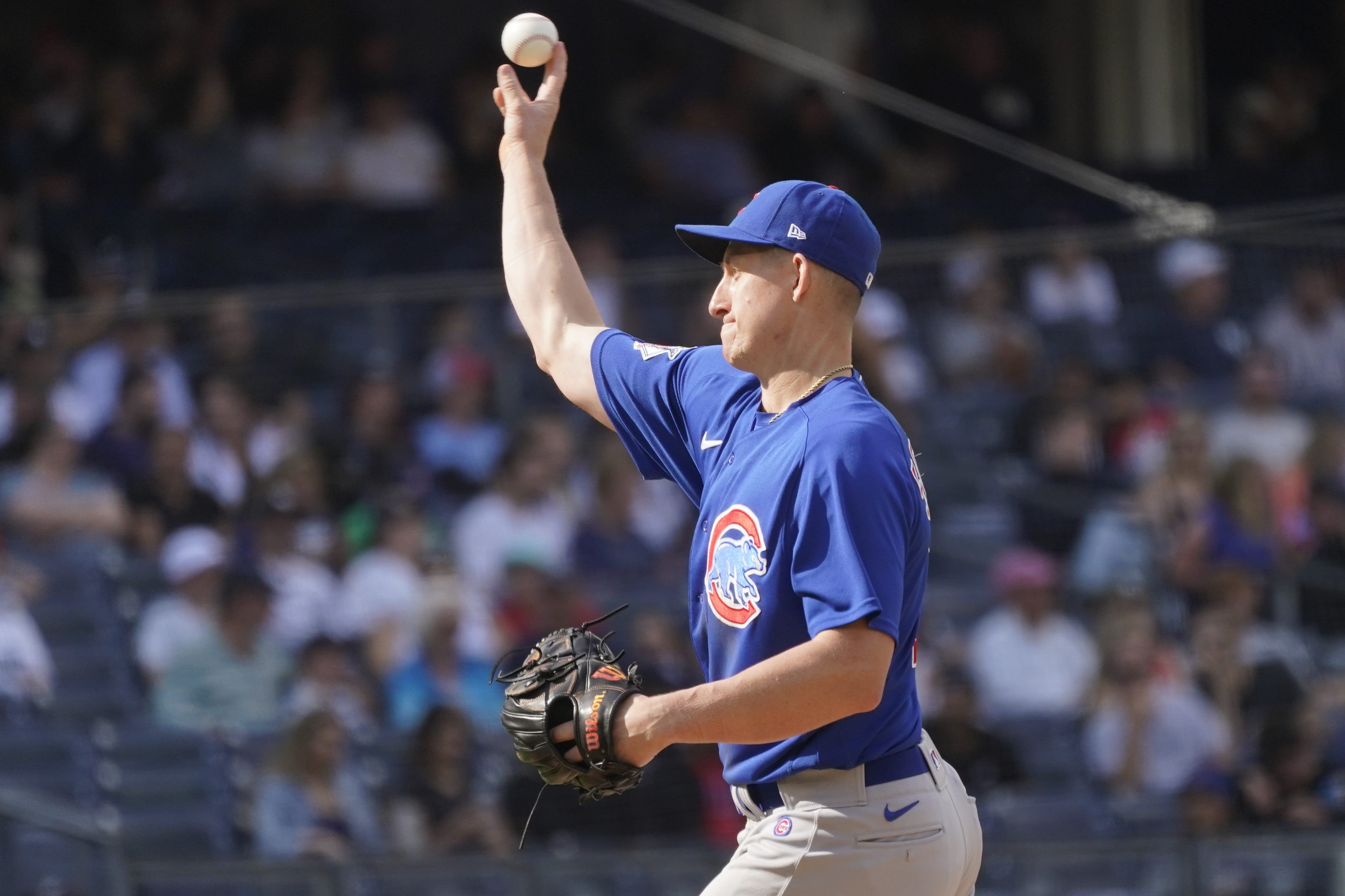 Chicago Cubs first baseman Frank Schwindel pitches in the eighth inning of a baseball game against the New York Yankees, Sunday, June 12, 2022, in New York. 