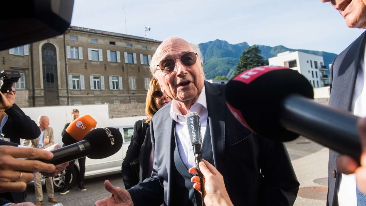 The former president of the World Football Association (FIFA), Joseph Blatter, speaks as he arrives at the Swiss Federal Criminal Court in Bellinzona, Switzerland, Wednesday, June 8, 2022. Blatter and the former president of the the European Football Association (UEFA), Michel Platini, will stand trial before the Federal Criminal Court from Wednesday, over a suspicious two-million payment.