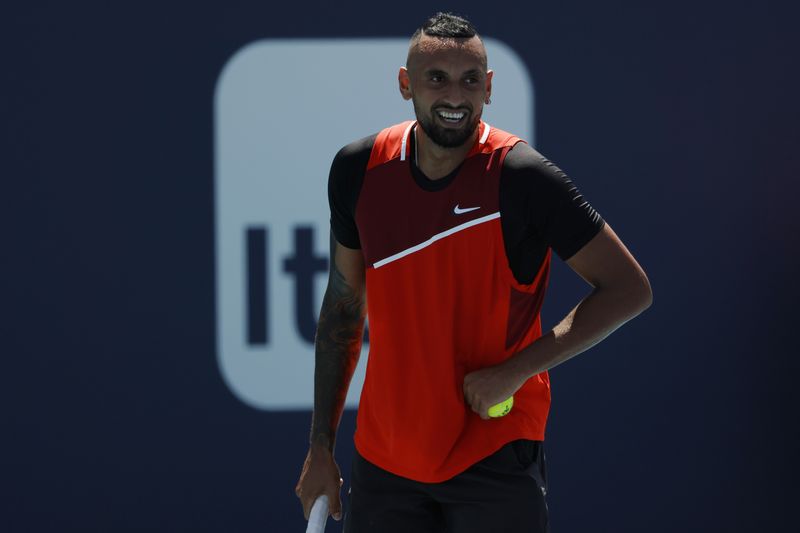 FILE PHOTO: Mar 29, 2022; Miami Gardens, FL, USA; Nick Kyrgios (AUS) smiles between points against Jannik Sinner (ITA)(not pictured) in a fourth round men's singles match in the Miami Open at Hard Rock Stadium.