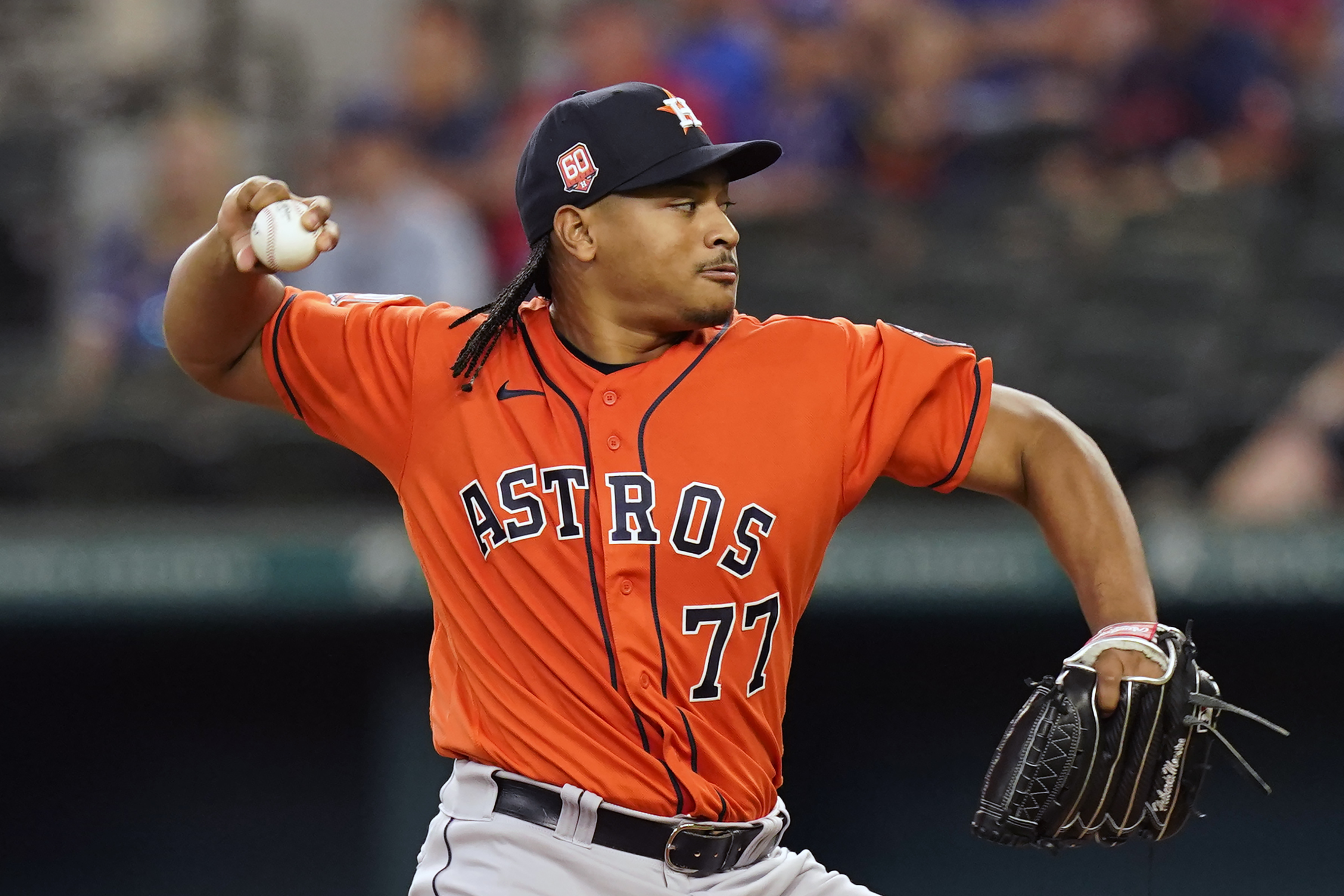 Houston Astros starting pitcher Luis Garcia throws during the first inning of a baseball game against the Texas Rangers in Arlington, Texas, Wednesday, June 15, 2022.