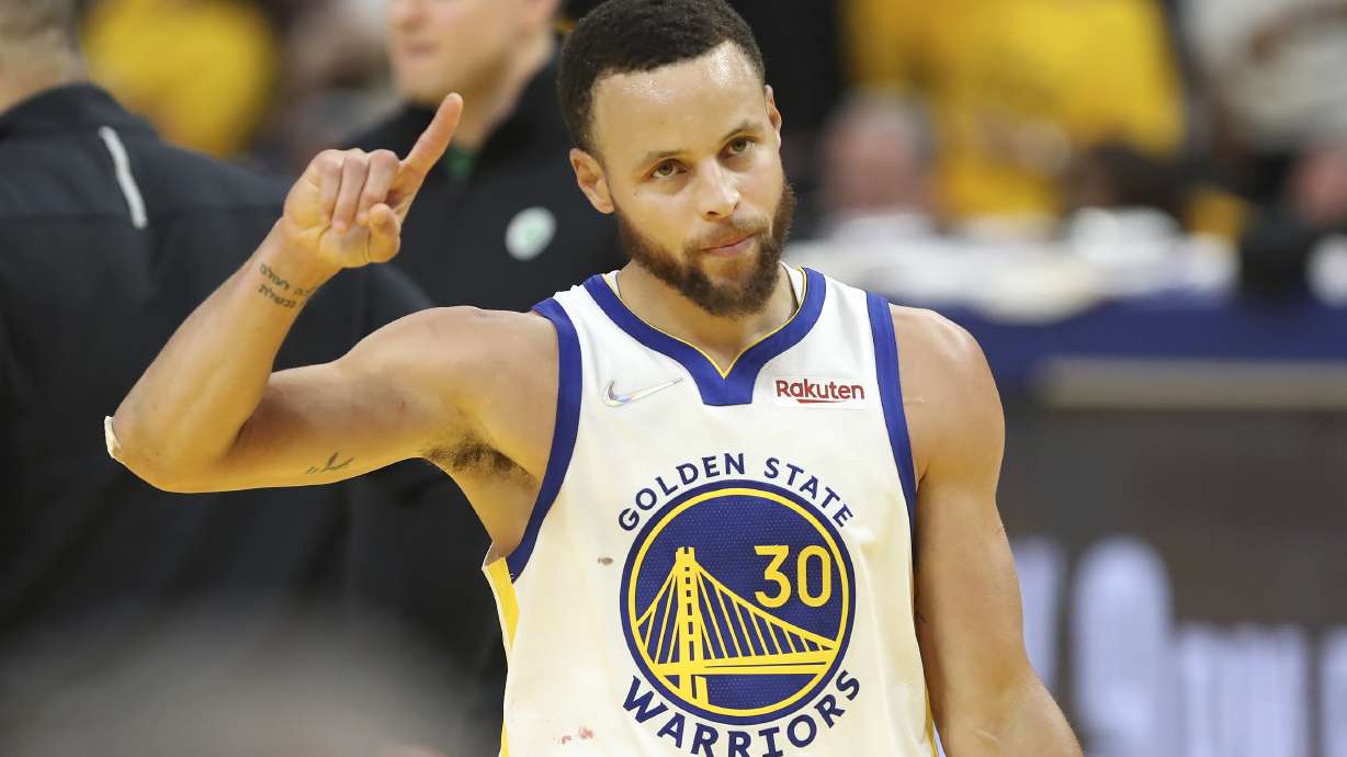 Golden State Warriors guard Stephen Curry (30) celebrates during the second half of Game 5 of basketball's NBA Finals against the Boston Celtics in San Francisco, Monday, June 13, 2022.