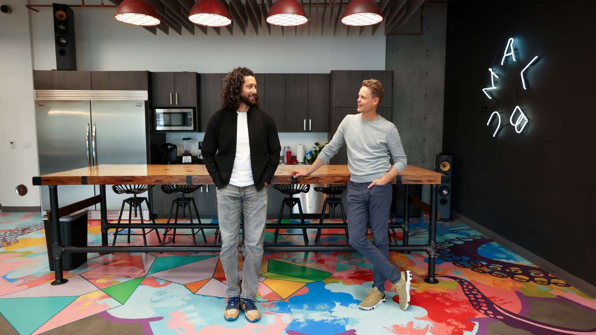 Album partners Sid Krommenhoek and John Mayfield talk at the Album office in Lehi on May 9.