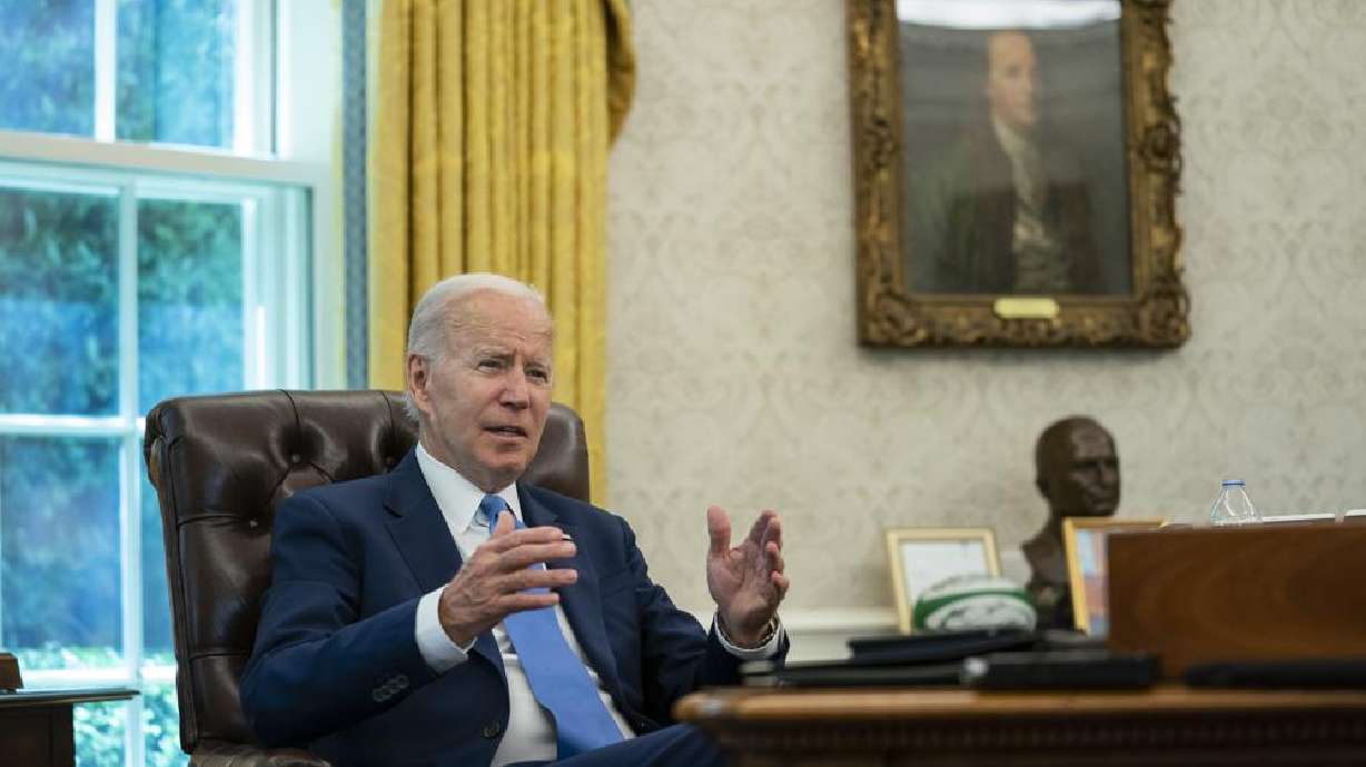 President Joe Biden speaks during an interview with the Associated Press in the Oval Office of the White House, Thursday in Washington. Biden says Americans are "really, really down" after a tumultuous two years, but a recession is not inevitable.