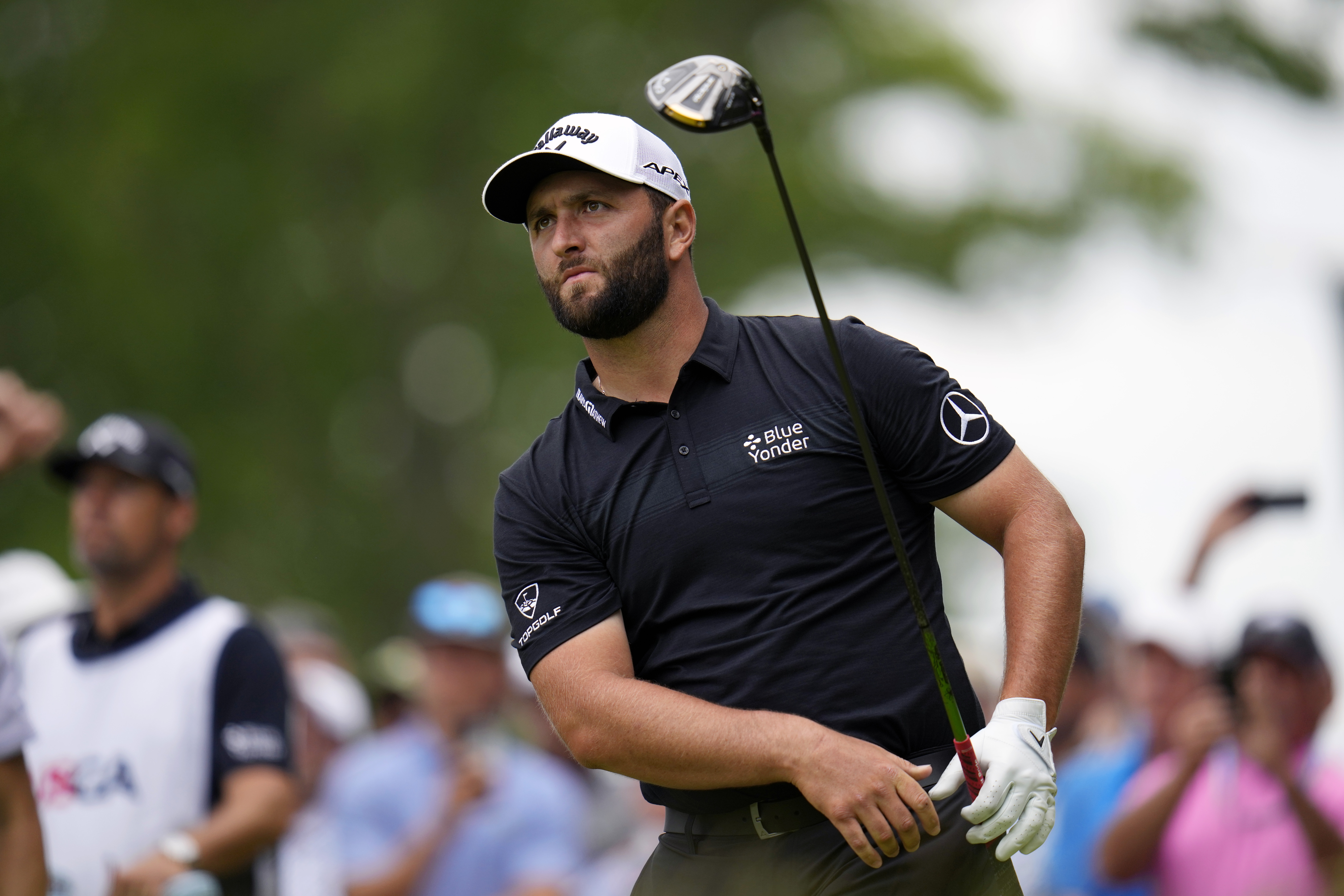 Jon Rahm, of Spain, watches his shot on the 15th hole during the first round of the U.S. Open golf tournament at The Country Club, Thursday, June 16, 2022, in Brookline, Mass. 