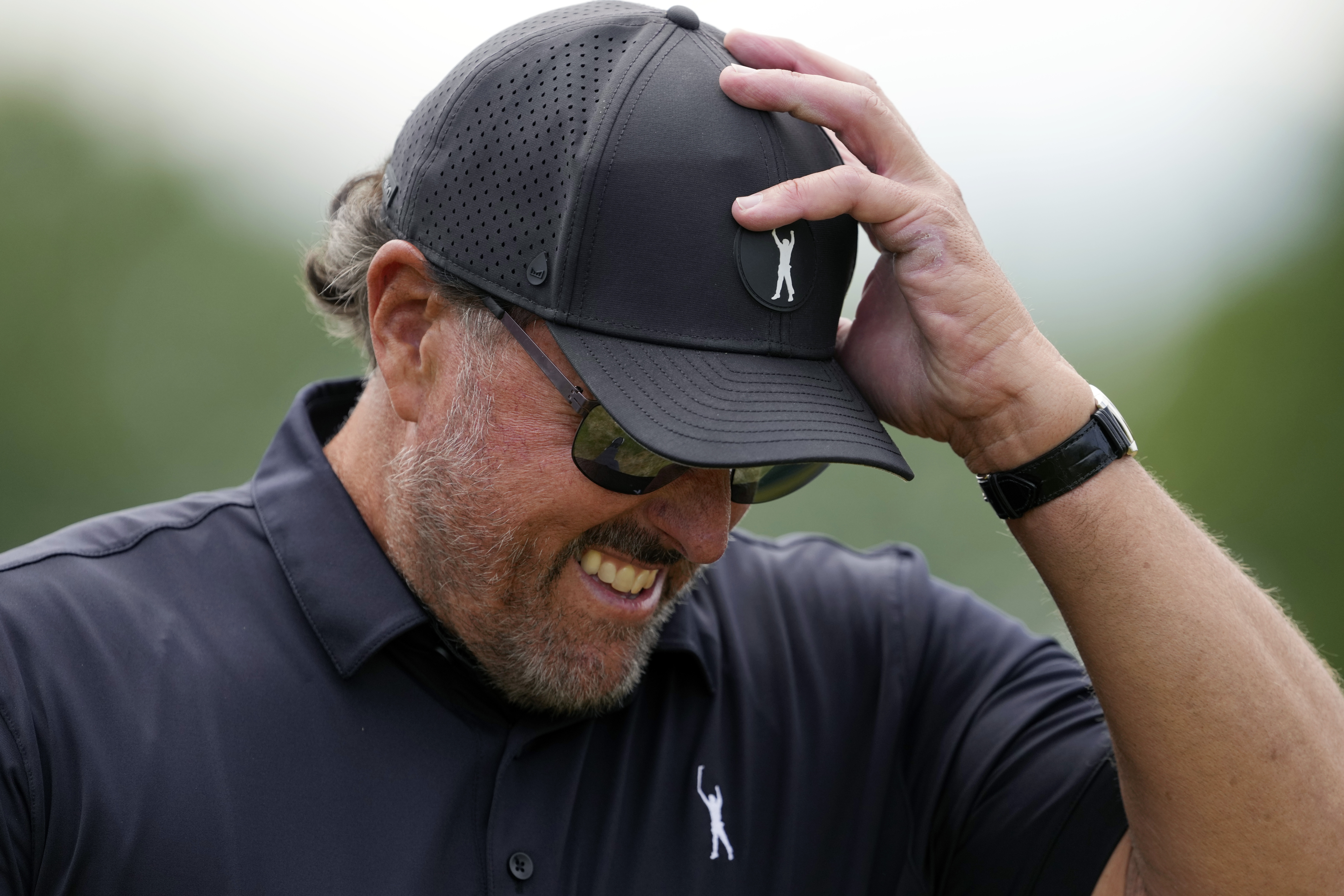 Phil Mickelson walks on the fourth hole during the first round of the U.S. Open golf tournament at The Country Club, Thursday, June 16, 2022, in Brookline, Mass. 