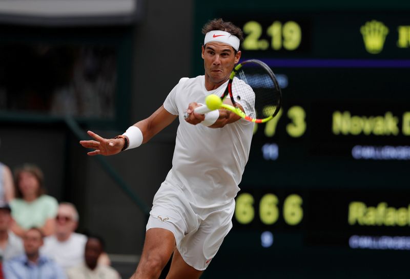 FILE PHOTO: Tennis - Wimbledon - All England Lawn Tennis and Croquet Club, London, Britain - July 14, 2018. Spain's Rafael Nadal in action during his semi final match against Serbia's Novak Djokovic
