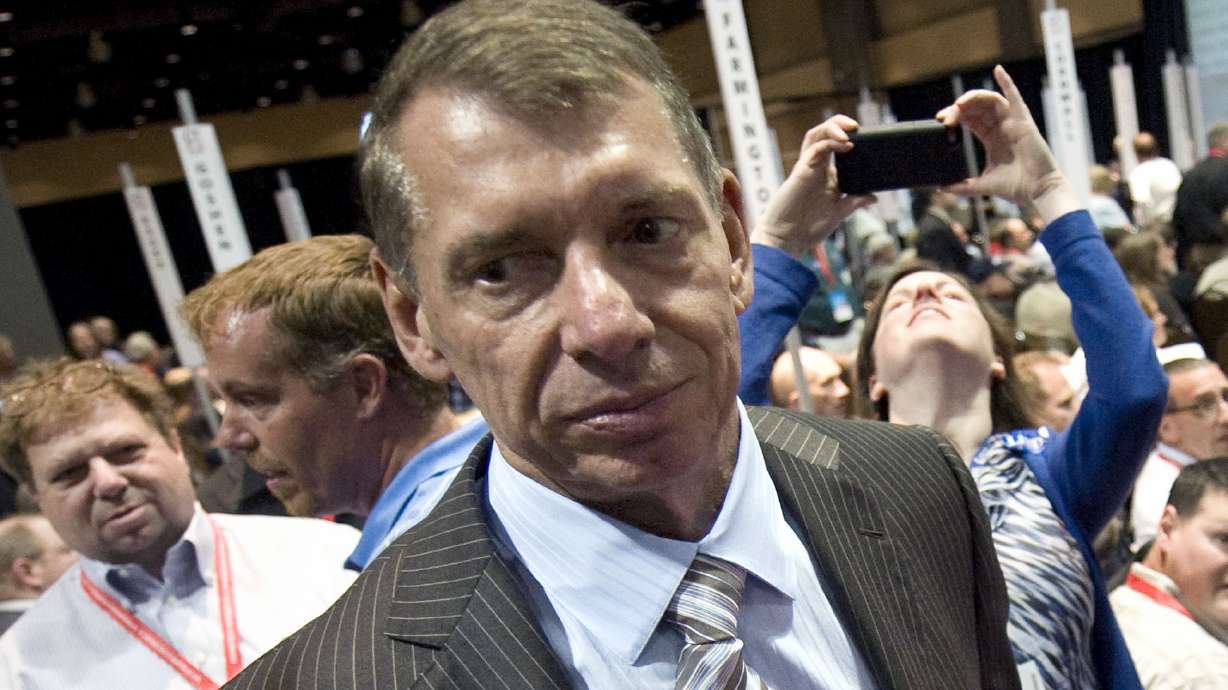 FILE - Vince McMahon stands at Republican state convention in Hartford, Conn., Friday, May 18, 2012. McMahon is voluntarily stepping back from his roles as CEO and chairman at WWE, Friday, June 17, 2022, as the sports entertainment company performs an investigation into alleged misconduct related to a relationship with a former employee.