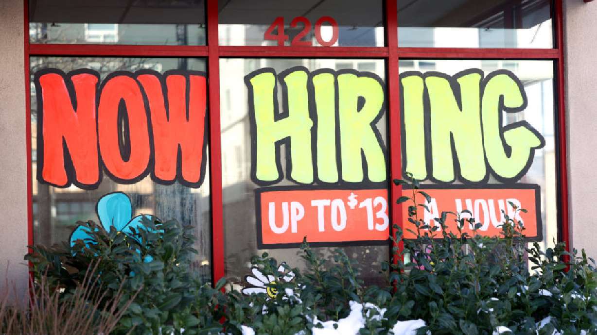 A “now hiring” sign at an Arby’s in Salt Lake City on Dec. 30, 2021. Utah's seasonally adjusted unemployment rate remains at 2.2%, the Department of Workforce Services reported Friday.