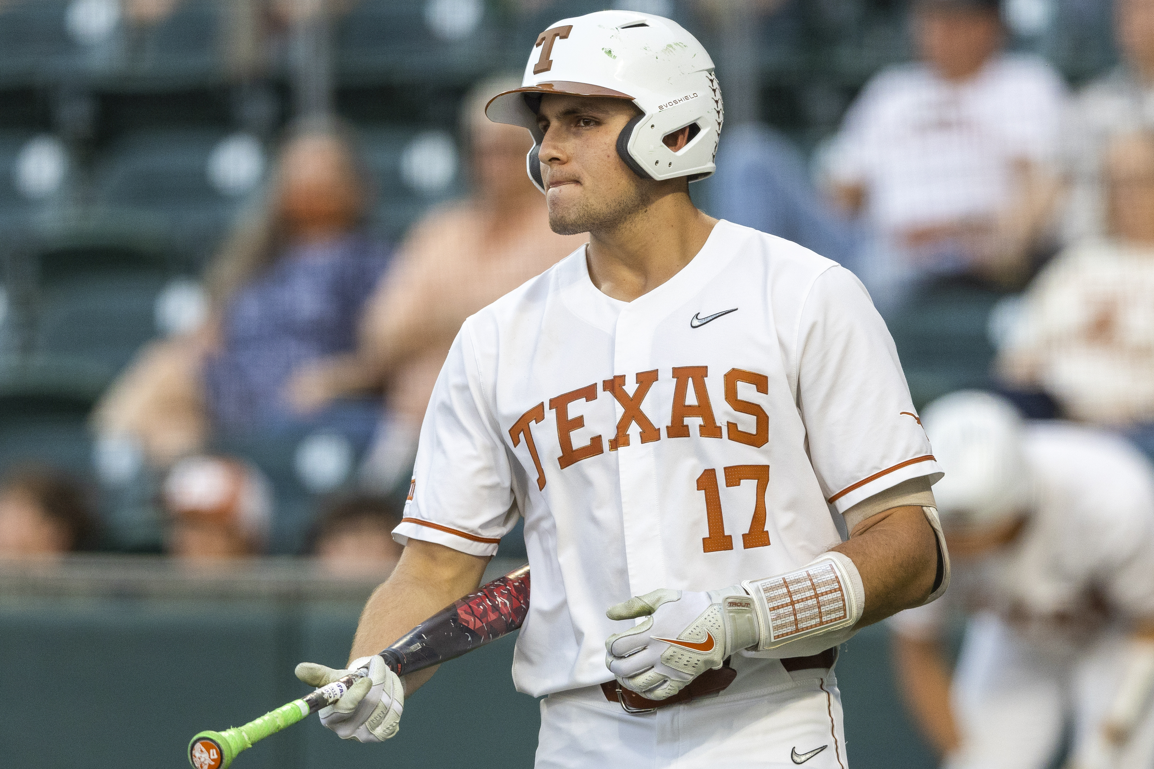 FILE - Texas first baseman Ivan Melendez walks to the batters box against Stephen F. Austin during an NCAA baseball game on Tuesday, April 12, 2022, in Austin, Texas. The 16 NCAA regional hosts will be announced on Sunday, May 29, 2022. 