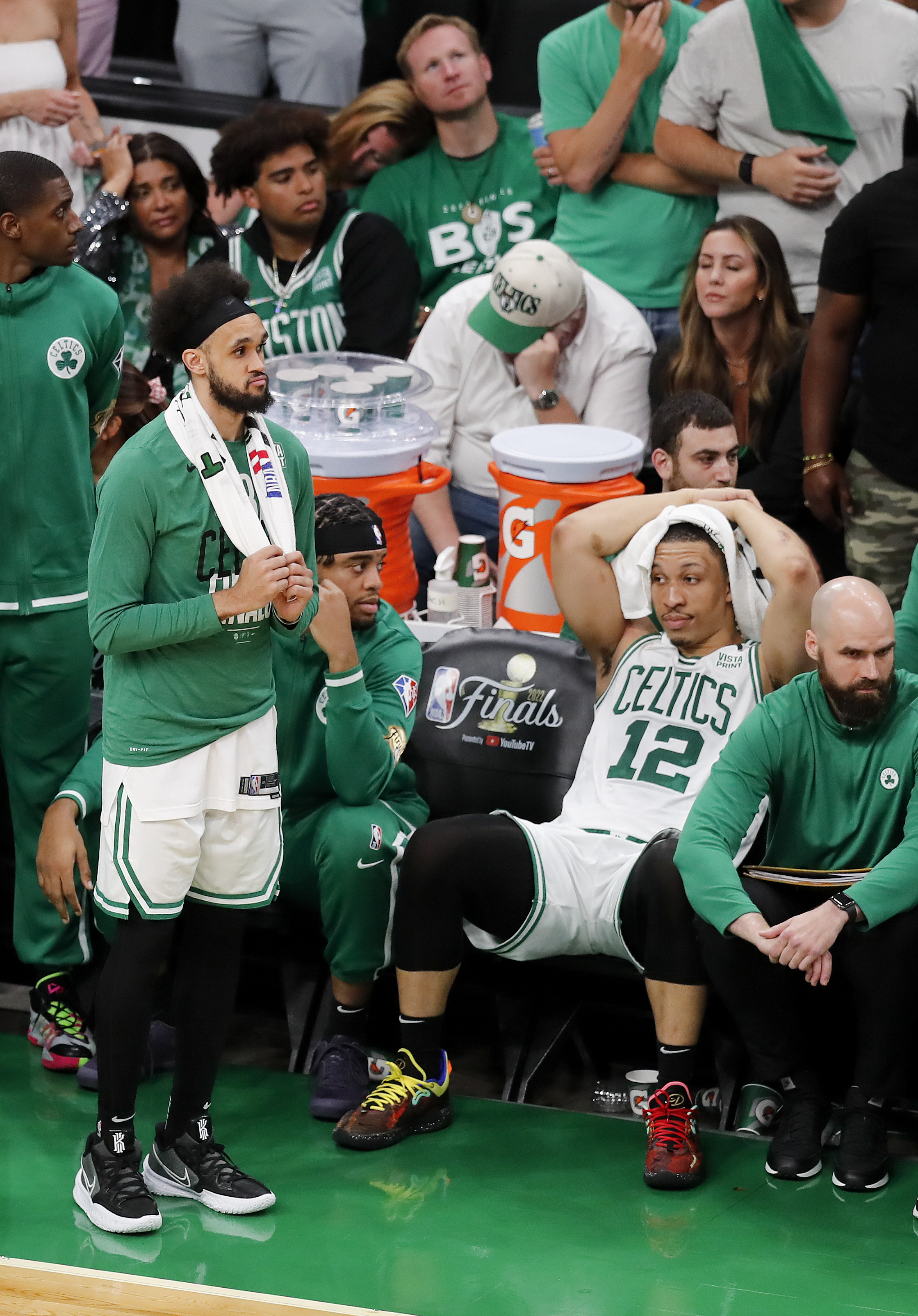 Boston Celtics guard Derrick White, left, and Boston Celtics forward Grant Williams (12) react in the closing second against the Golden State Warriors during Game 6 of basketball's NBA Finals, Thursday, June 16, 2022, in Boston. 