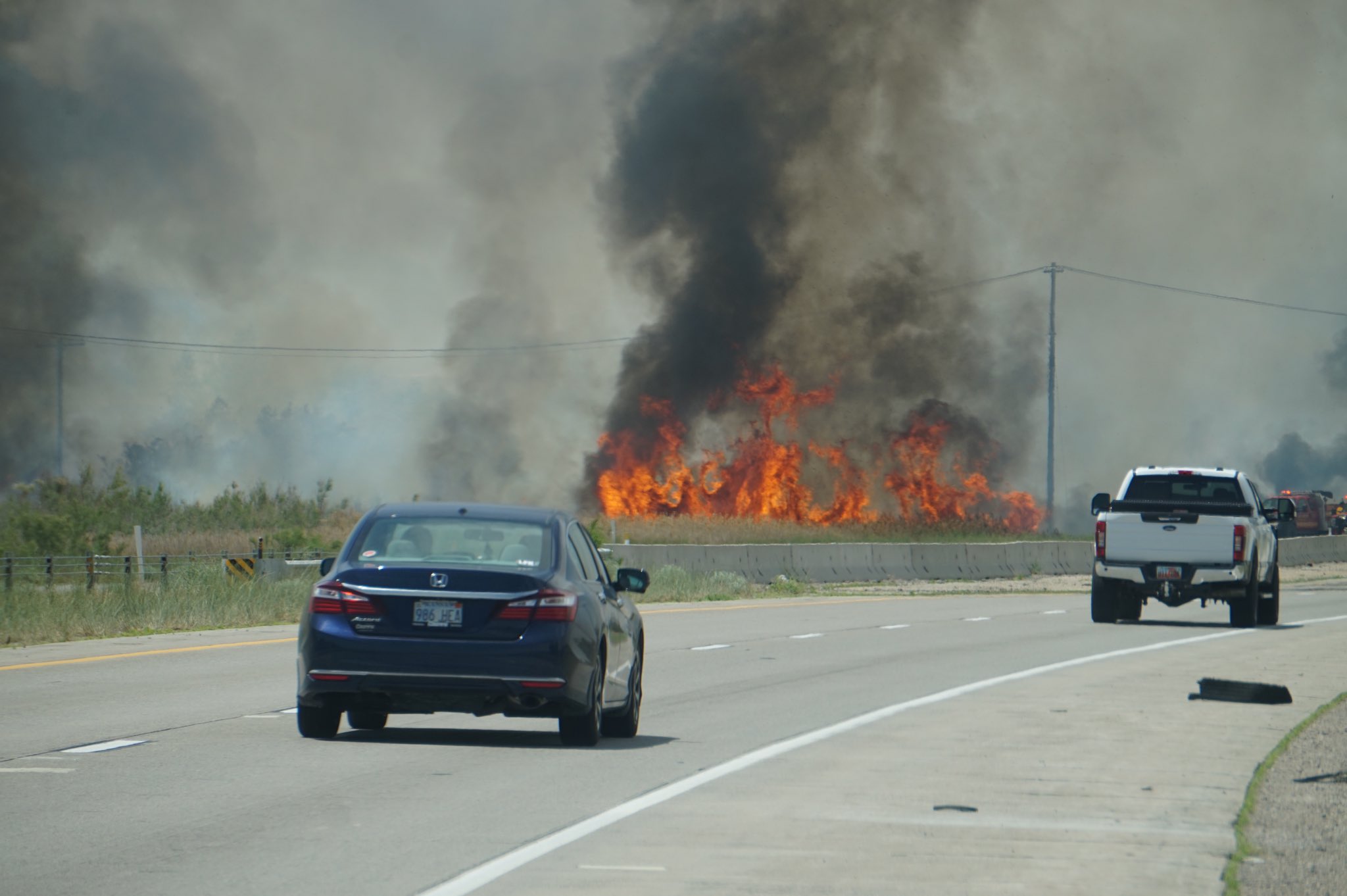 Two main freeways were temporarily closed in northern Utah on Friday due to wildfires. The strong winds also prompted warnings and power interruptions.