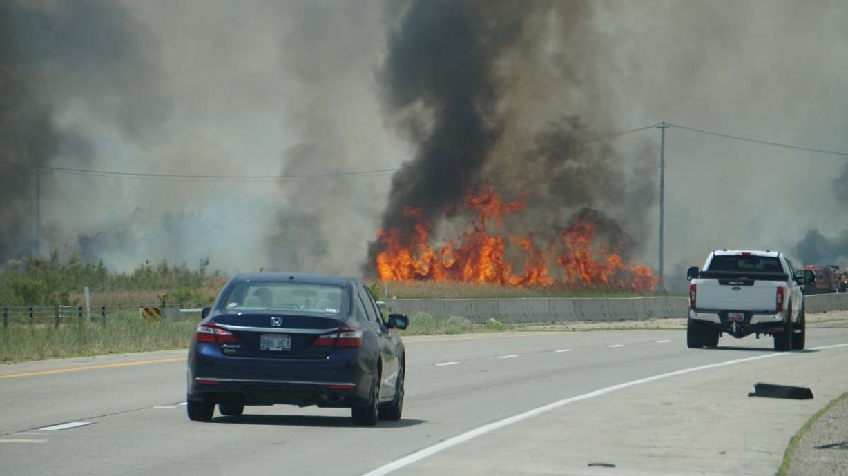 Two main freeways were temporarily closed in northern Utah on Friday due to wildfires. The strong winds also prompted warnings and power interruptions.