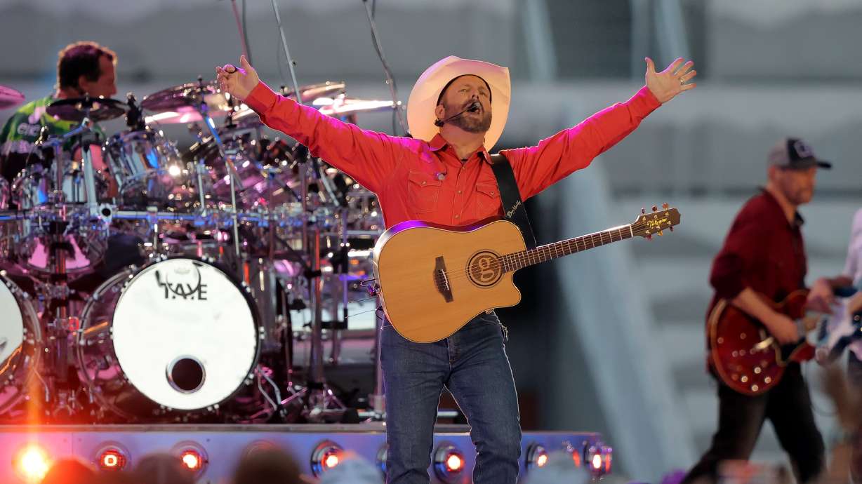 Country music superstar Garth Brooks performs at Rice-Eccles Stadium at the University of Utah in Salt Lake City on July 17, 2021. With the influx of traffic for the Brooks concert Friday and Saturday, travelers in Salt Lake City are advised to plan ahead for both nights of the concert.