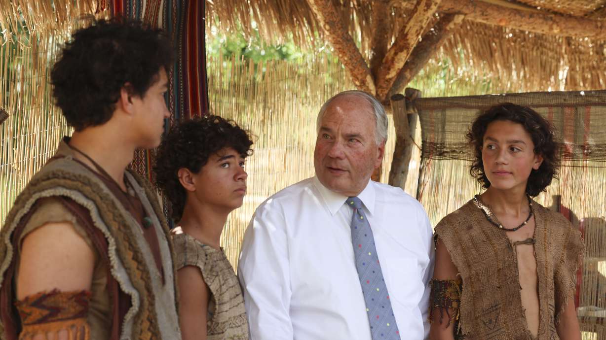 Elder Ronald A. Rasband speaks with Tuliloa Pauga, left, Zeka Nichols and Joseph Andelin during the final filming season of The Church of Jesus Christ of Latter-day Saints’ production of the Book of Mormon videos at the LDS Motion Picture Studios South in Provo on Friday.