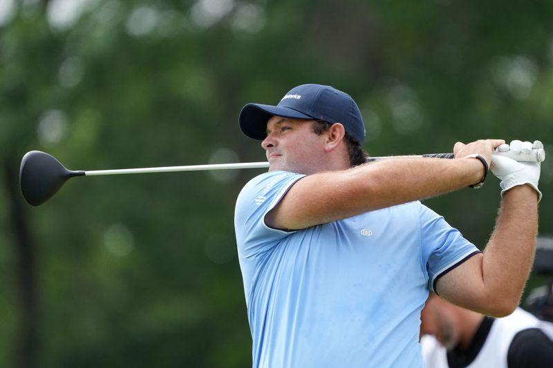 Jun 17, 2022; Brookline, Massachusetts, USA; Patrick Reed plays his shot from the 10th tee during the second round of the U.S. Open golf tournament.
