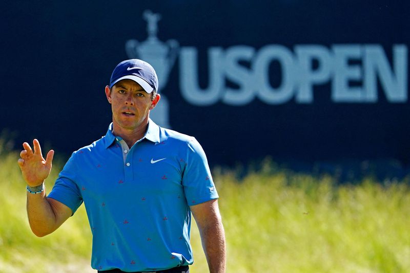Jun 17, 2022; Brookline, Massachusetts, USA; Rory McIlroy reacts to his putt on the 12th green during the second round of the U.S. Open golf tournament.