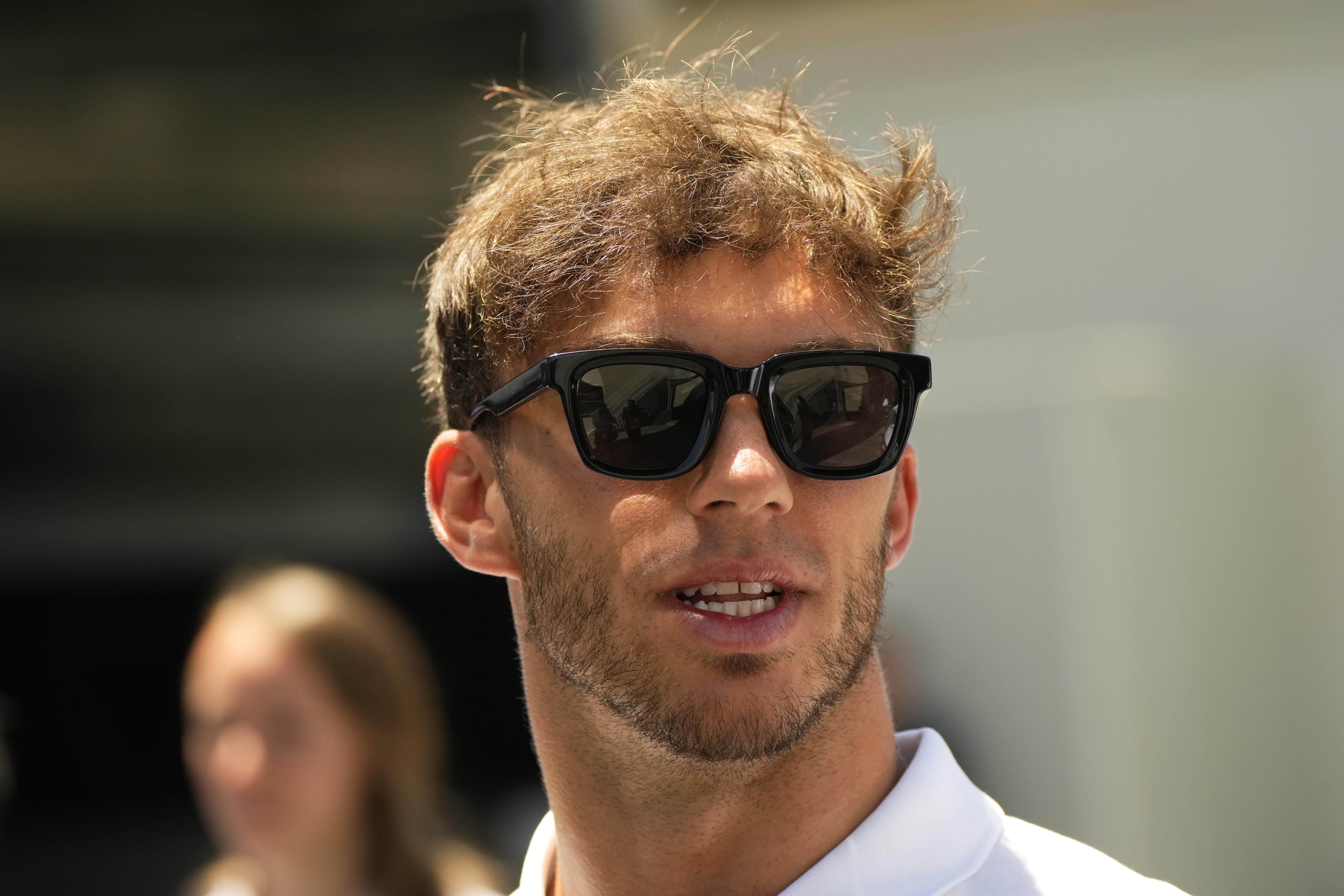 AlphaTauri driver Pierre Gasly of France arrives prior to the third free practice at the Baku circuit, in Baku, Azerbaijan, Saturday, June 11, 2022. The Formula One Grand Prix will be held on Sunday. 