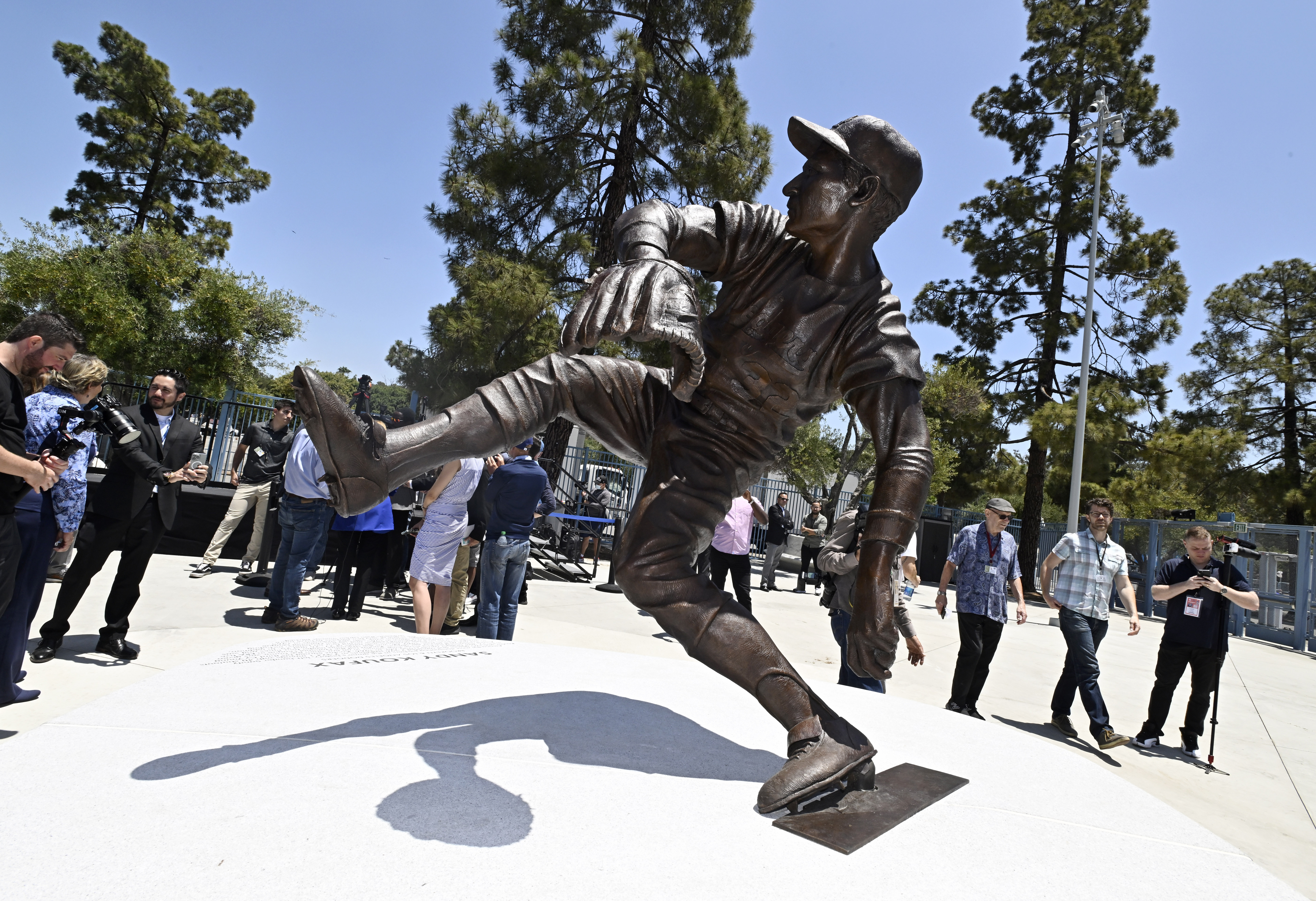 The Los Angeles Dodgers unveil a Sandy Koufax statue in the Centerfield Plaza to honor the Hall of Famer and three-time Cy Young Award winner prior to a baseball game between the Cleveland Guardians and the Dodgers at Dodger Stadium in Los Angeles, Saturday, June 18, 2022. 