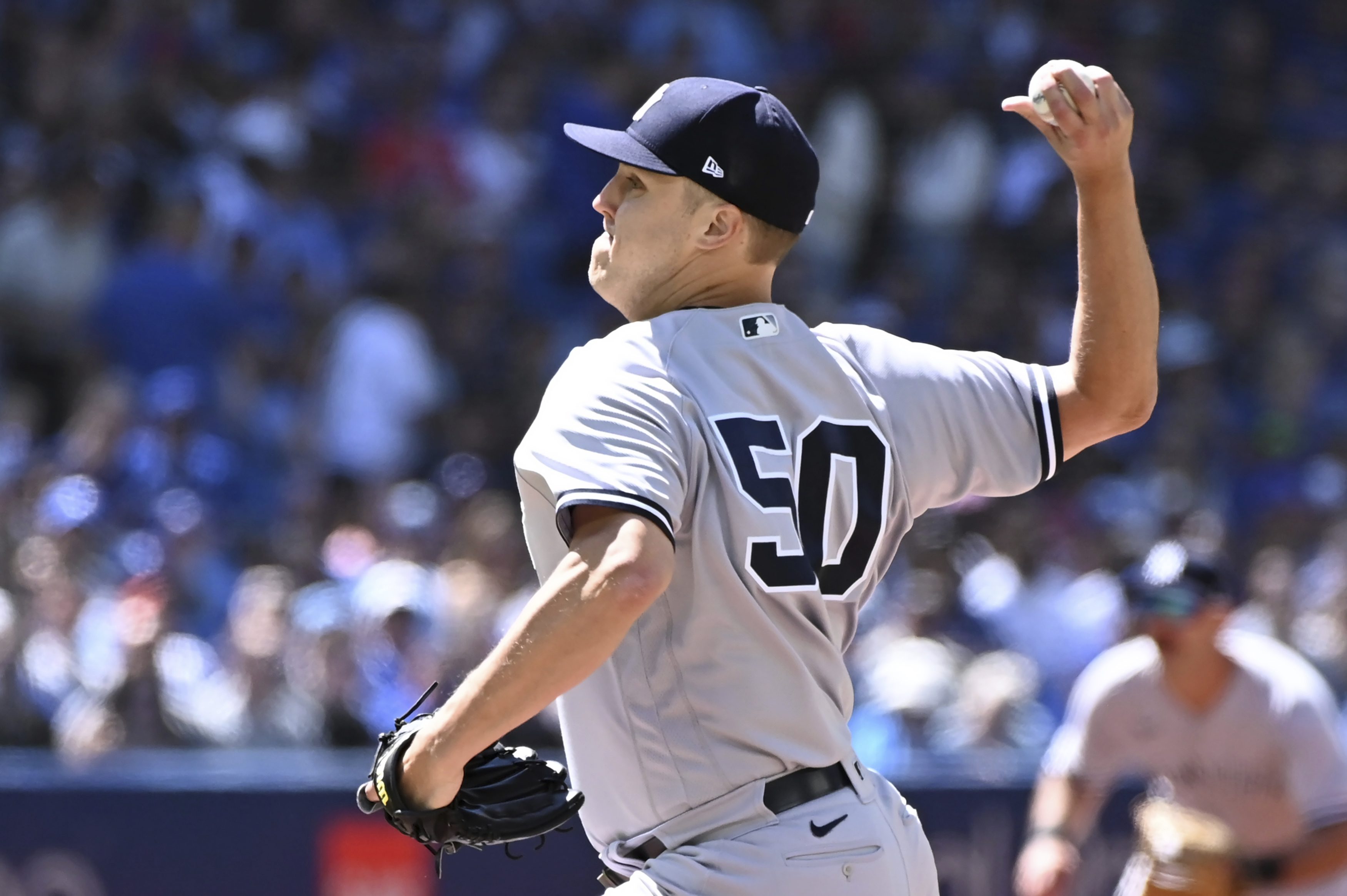 New York Yankees starting pitcher Jameson Taillon throws to a Toronto Blue Jays batter in the first inning of a baseball game in Toronto, Saturday, June 18, 2022. 